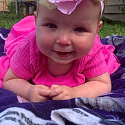 Daphne joined the competition — help win amazing prizes! baby, child, pink_clothing, flower_headband, blanket, outdoor, grass, smiling, portrait, headwear, cute, infant, happy, toddler, closeup, nature, person, baby_girl, head, playful