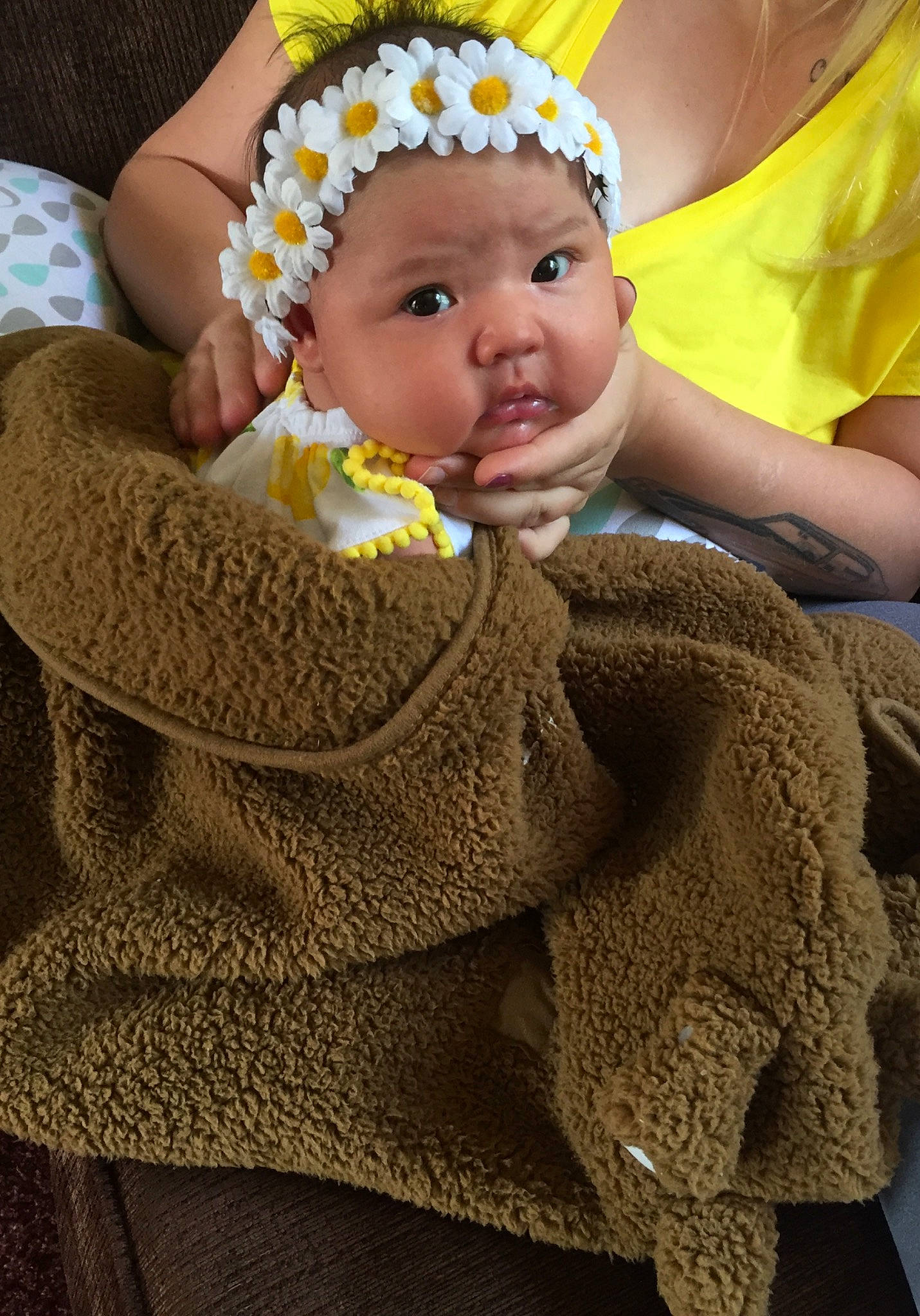 Oakley is registered to the contest to win money with this photo: art, baby, child, crochet, fashion_accessory, fun, headgear, headwear, knitting, outerwear, person, smile, textile, toddler, wool, woolen, yellow