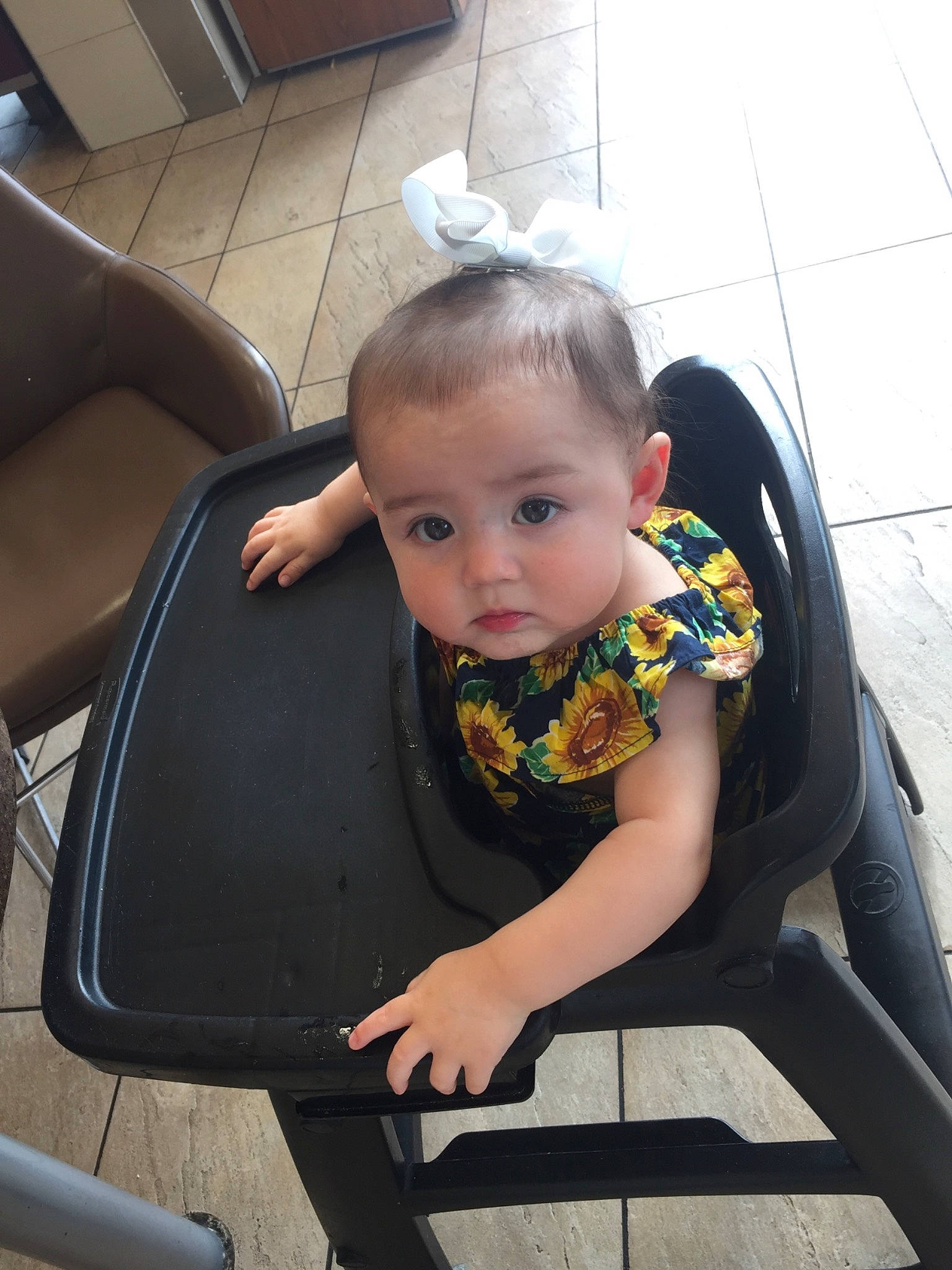 Giovanna joined the competition — help win amazing prizes! baby, baby_carriage, car_seat, chair, child, hairstyle, leg, person, product, sitting, skin, toddler, vacation, wetsuit