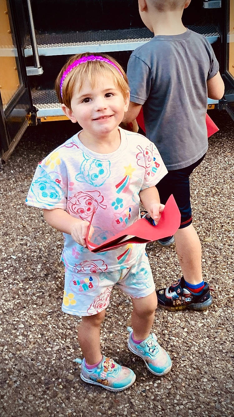 Maelee is registered to the contest to win money with this photo: baby_toddler_clothing, child, face, fun, grass, hairstyle, happy, joy, leisure, magenta, person, photograph, pink, public_space, recreation, shoe, shorts, smile, sneakers, summer