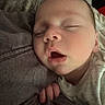Jackson is registered to the contest to win money with this photo: baby, sleeping, face, mouth_open, hand, infant, soft_fabric, closeup, peaceful, rest, skin, head, child, portrait, cozy, indoors, newborn, cute, relaxation, toddler