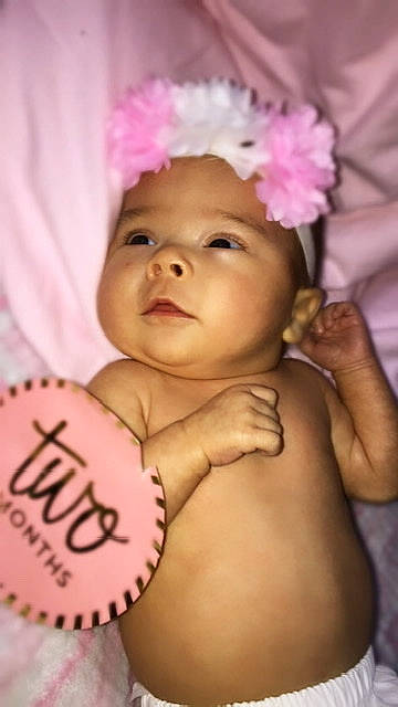 Adelyn joined the competition — help win amazing prizes! baby, baby_bloomers, baby_products, baby_toddler_clothing, brown, cheek, child, fashion_accessory, hair_accessory, headband, headgear, headpiece, headwear, person, photography, pink, product, skin, sweetness, toddler