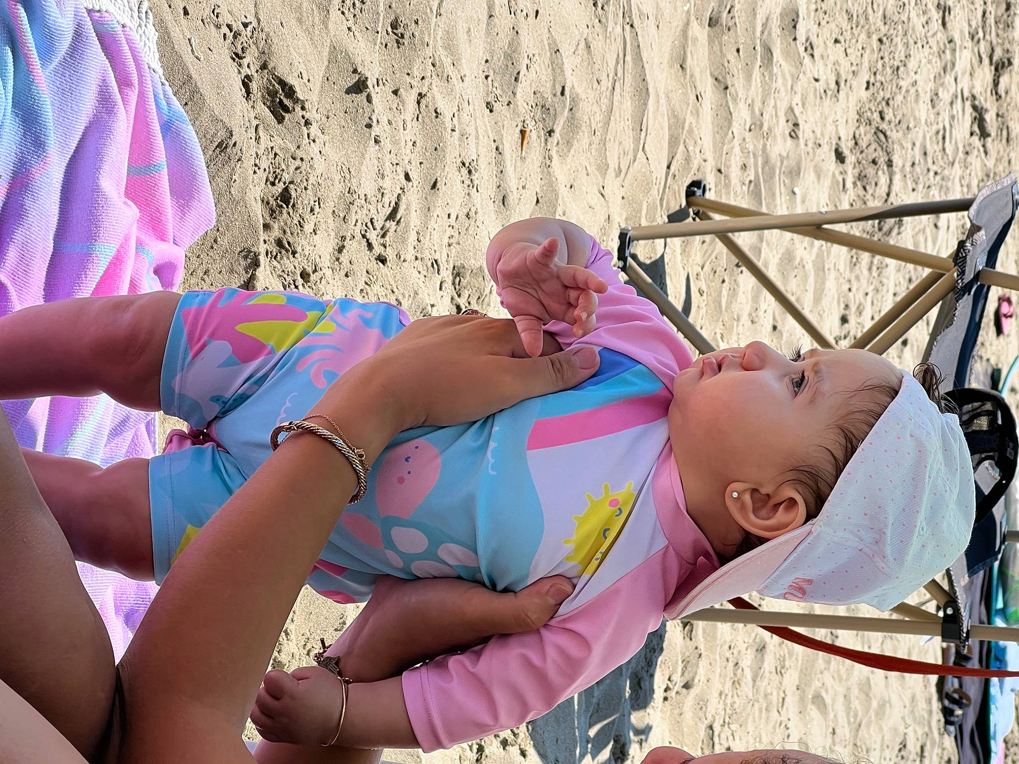 Naya participe au concours pour gagner de l'argent avec cette photo : beach, body_of_water, chest, eyewear, fun, happy, hat, human_body, joint, leg, leisure, people_on_beach, person, pink, recreation, skin, summer, sunglasses, swimwear, thigh