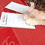 Sangria a rejoint le concours — aidez-le/la à gagner de superbes lots ! cat, table, red_tablecloth, paper, notes, writing, indoor, pet, feline, curious, paw, closeup, domestic_animal, striped_cat, white_paw, texture, fabric, home, relaxing, surface