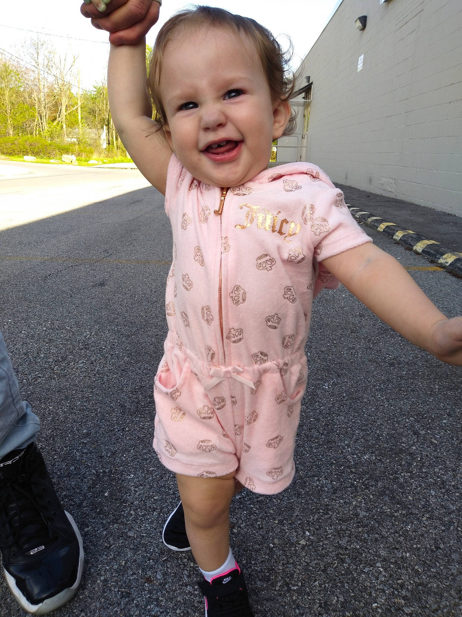 Amarah is registered to the contest to win money with this photo: arm, baby, baby_toddler_clothing, child, footwear, fun, happy, head, leg, person, pink, play, shoe, skin, sleeve, smile, standing, t_shirt, toddler, vacation
