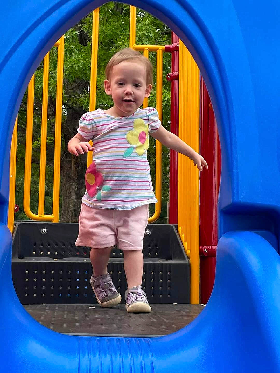 Jasmin joined the competition — help win amazing prizes! blue, child, chute, city, fun, green, leisure, line, organ, person, photograph, playground, recreation, red, smile, standing, summer, t_shirt, toddler, white