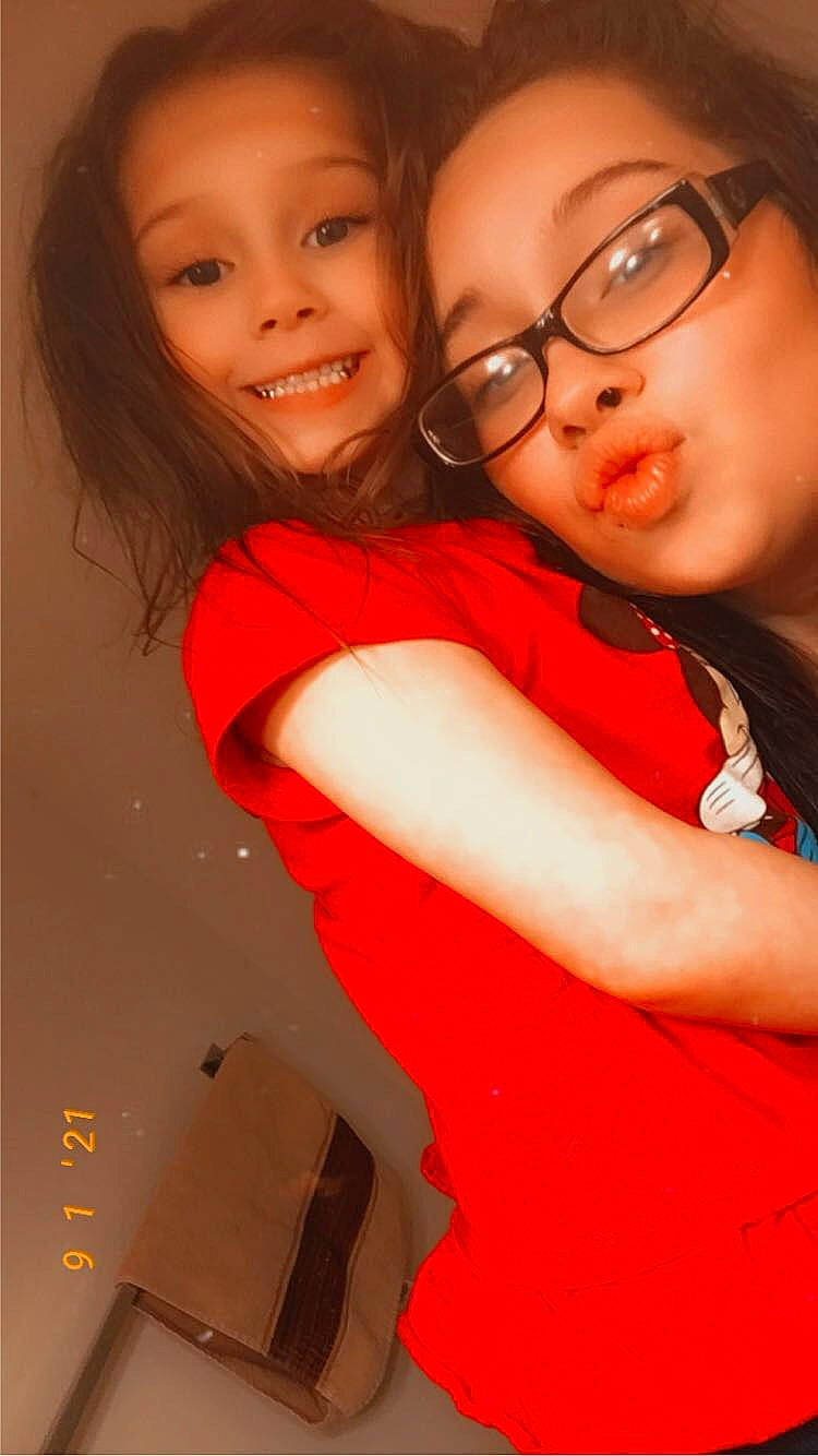 Wiley is registered to the contest to win money with this photo: arm, cheek, chin, eye, face, facial_expression, flash_photography, gesture, glasses, hair, happy, head, iris, joy, lip, nose, person, red, skin, sleeve