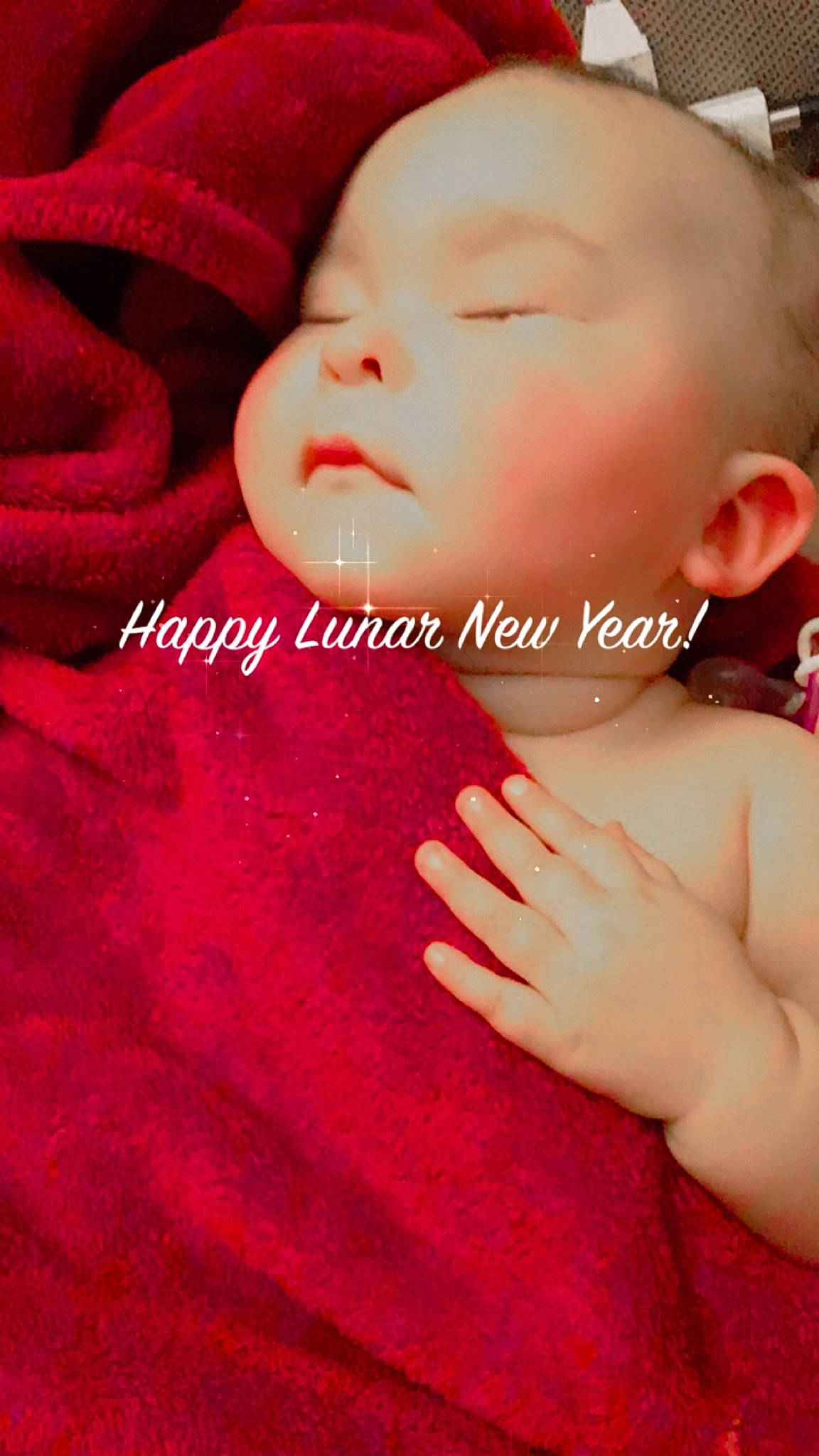 Constance is registered to the contest to win money with this photo: baby, baby_toddler_clothing, child, comfort, eyelash, finger, font, gesture, happy, lip, nail, nose, pattern, person, photo_caption, pink, red, skin, smile, thumb