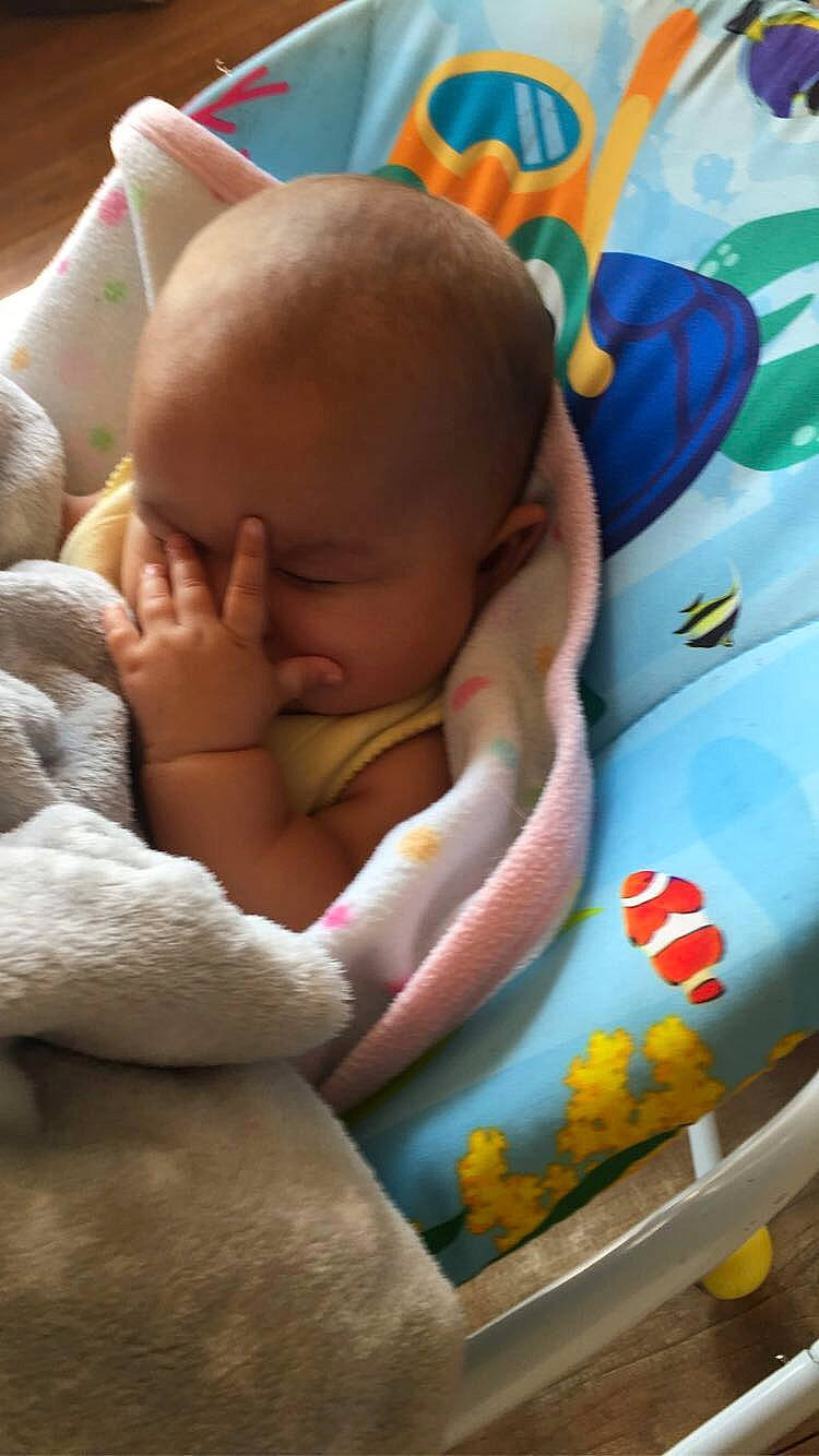 Constance is registered to the contest to win money with this photo: abdomen, baby, baby_products, baby_safety, baby_sleeping, baby_toddler_clothing, bedding, bedtime, cheek, chest, child, comfort, finger, grass, human_body, linens, nap, person, room, thumb