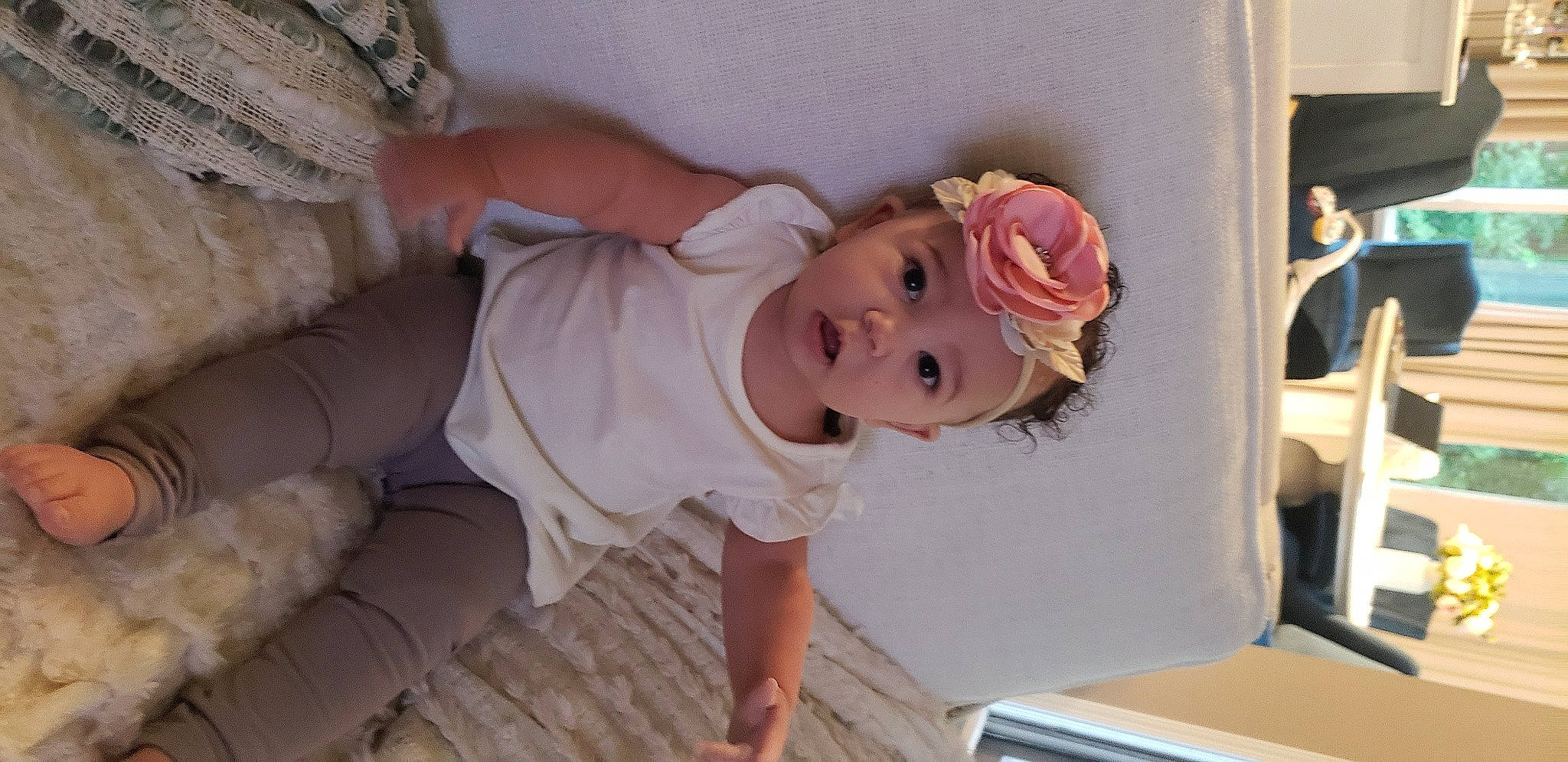 Renesmae joined the competition — help win amazing prizes! baby, baby_toddler_clothing, cheek, child, fur, head, headwear, mouth, nose, person, pink, sock, surprise, toddler