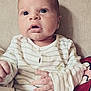 baby, infant, face, hand, onesie, clothing, striped, expression, cute, child, newborn, skin, person, portrait, indoors, soft, texture, curious, wide_eyes, small_hands