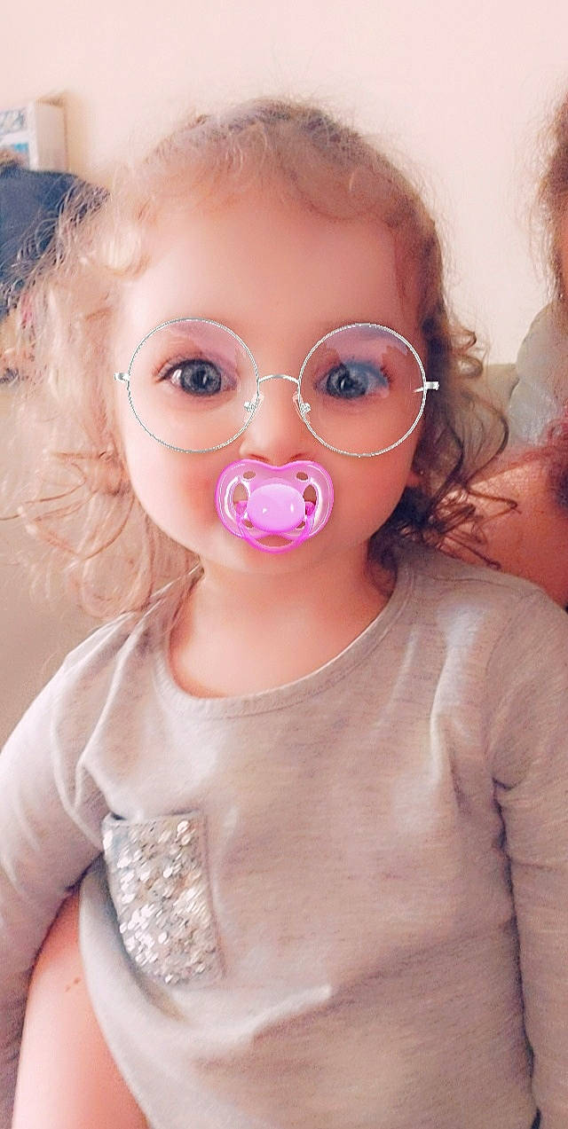 Eleanor participe au concours pour gagner de l'argent avec cette photo : baby, baby_toddler_clothing, cheek, cool, ear, eye, eyebrow, eyelash, eyewear, glasses, goggles, happy, iris, lip, mouth, nose, person, pink, skin, toddler