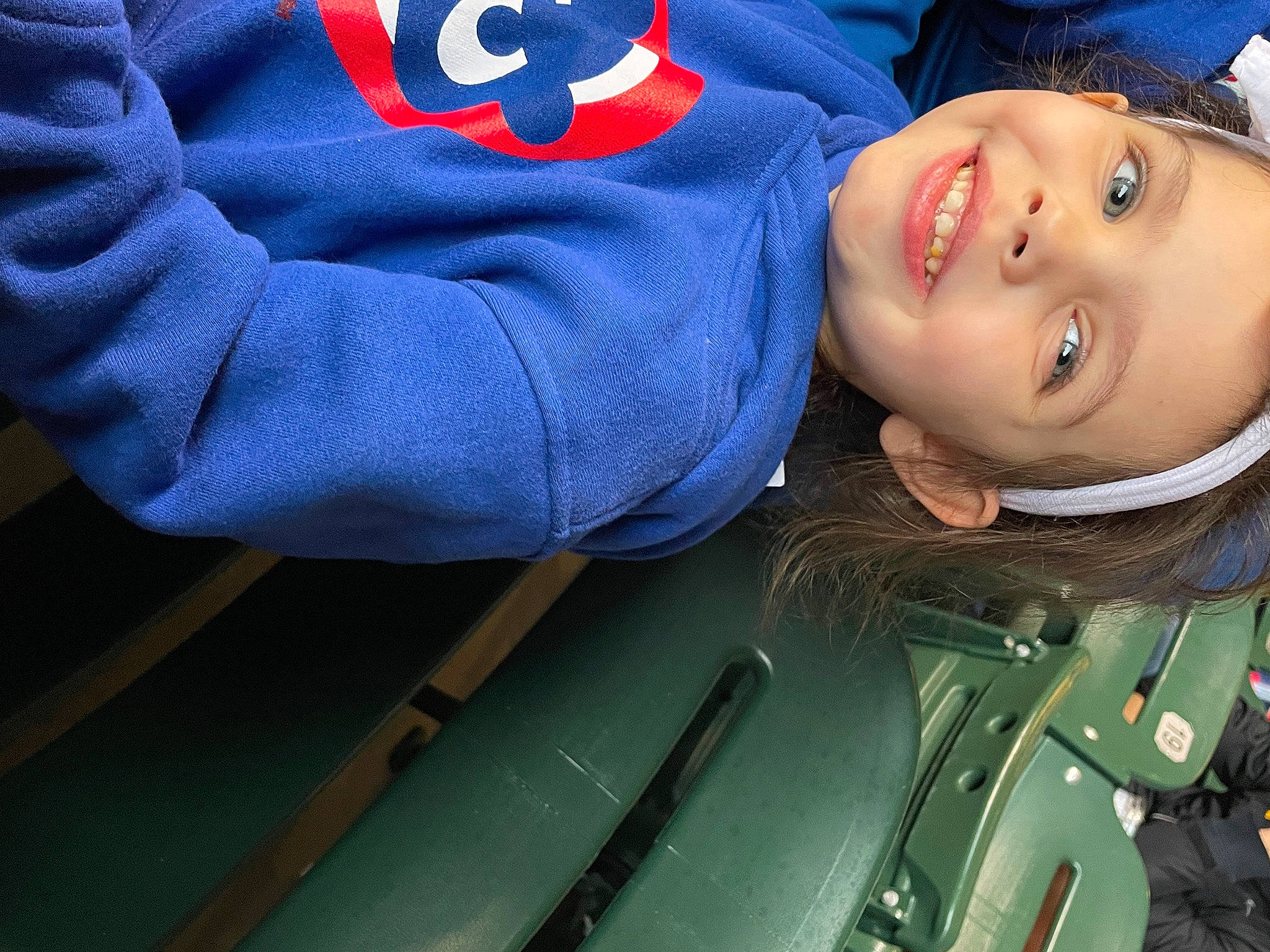 Paislee Marie is registered to the contest to win money with this photo: baby_toddler_clothing, blue, cap, carmine, child, cool, denim, elbow, electric_blue, eye, facial_expression, grass, happy, hat, joy, pattern, person, portrait_photography, sitting, sleeve