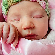 Elizabeth joined the competition — help win amazing prizes! baby, newborn, sleeping, face, hand, blanket, pink, crocheted_hat, soft_texture, closeup, infant, peaceful, cute, cozy, portrait, wrapped, child, sleep, rest, warm