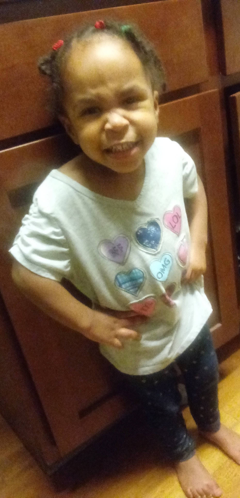 Jamiyah is registered to the contest to win money with this photo: arm, cheek, child, cool, day, eye, face, finger, girl, hair, hairstyle, head, human_hair_color, infant, mouth, nose, organ, person, product, skin