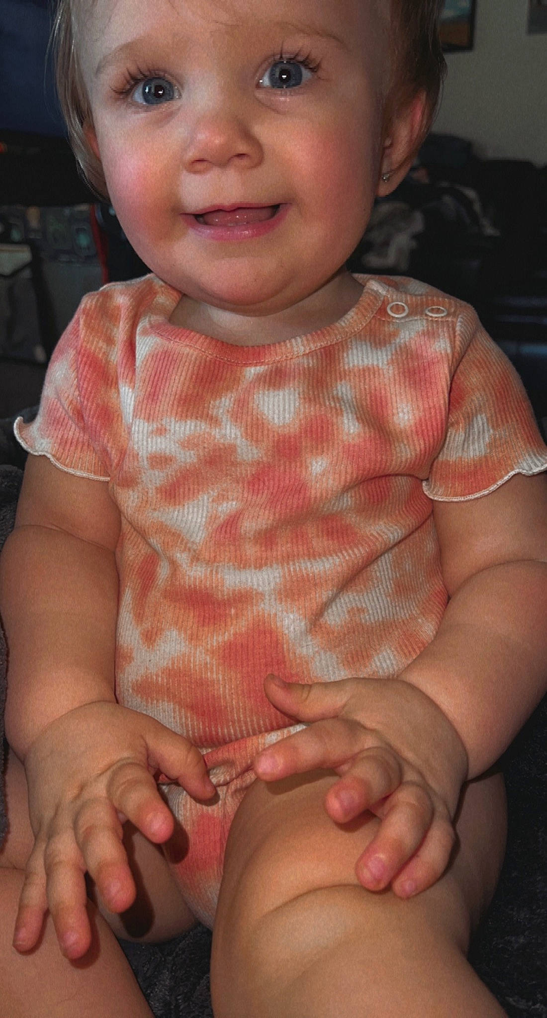 Madison is registered to the contest to win money with this photo: arm, baby_toddler_clothing, cheek, chin, face, finger, hand, headwear, human, joint, joy, lip, mouth, muscle, nose, organ, person, pink, skin, sleeve