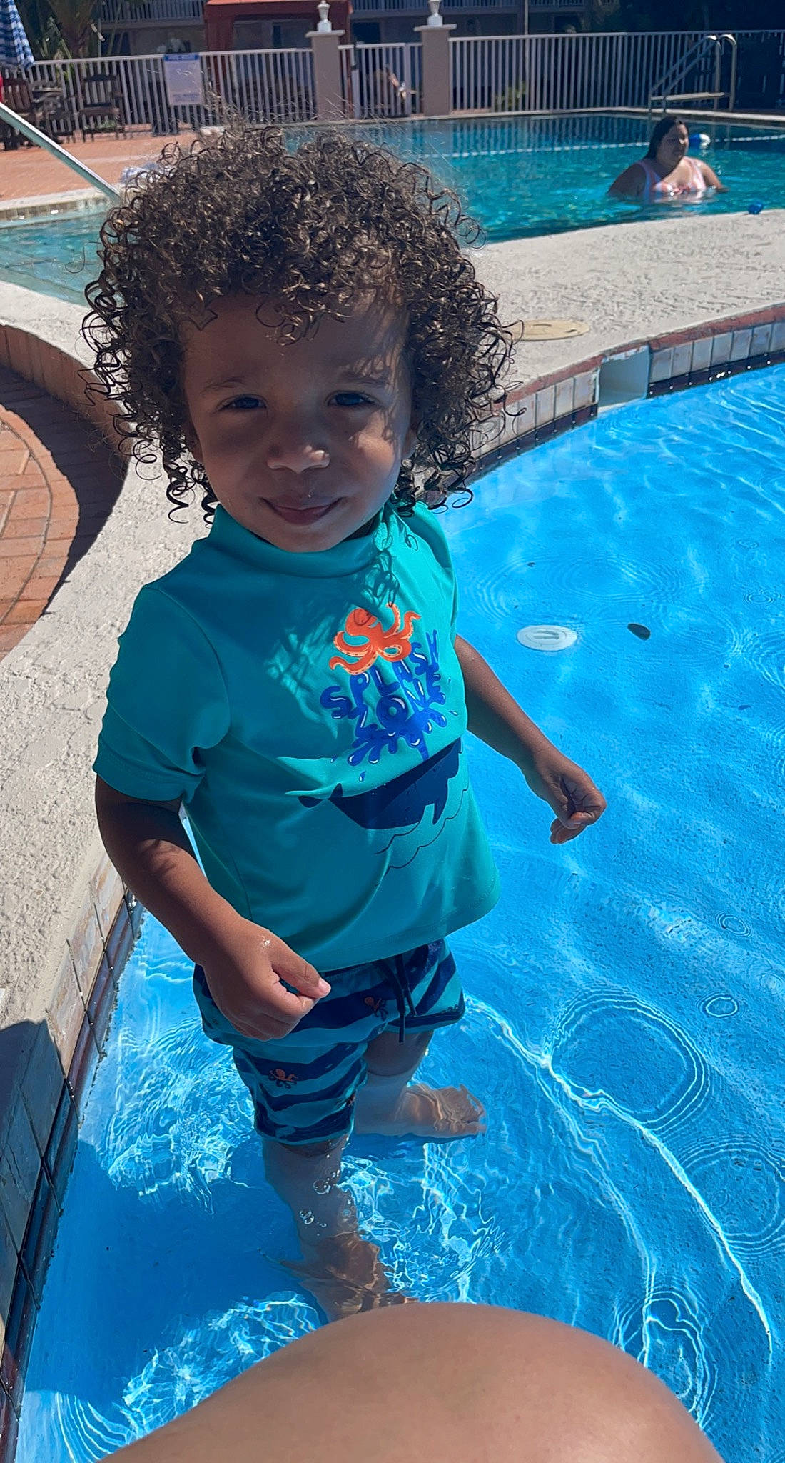 Cyprus is registered to the contest to win money with this photo: aqua, azure, blue, child, cool, electric_blue, fun, happy, leisure, person, personal_protective_equipment, photograph, recreation, shorts, smile, summer, swimming_pool, t_shirt, toddler, water