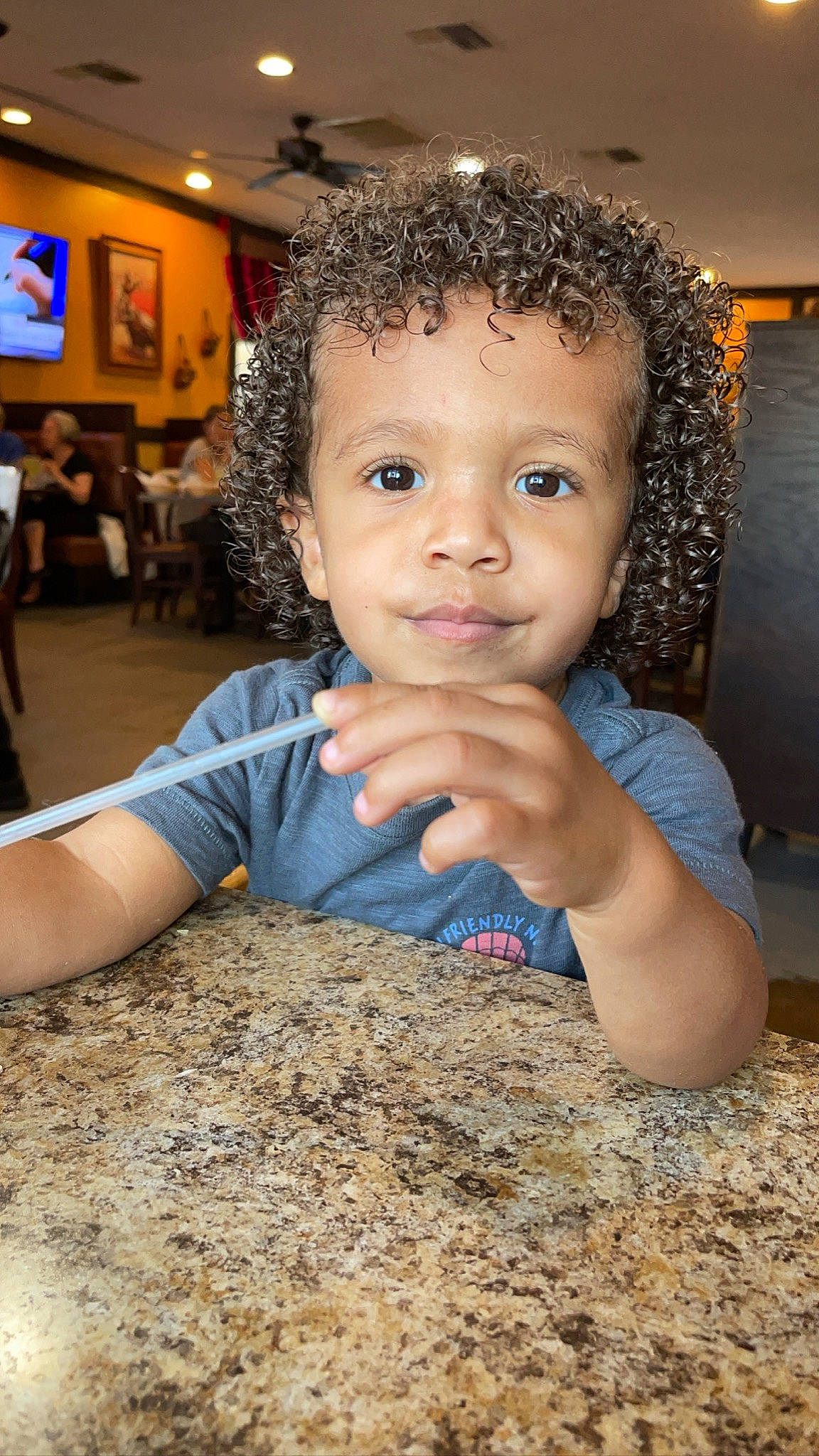 Cyprus is registered to the contest to win money with this photo: afro, chair, cheek, child, chin, couch, flooring, fun, hair, hairstyle, happy, jheri_curl, leisure, nose, people, person, picture_frame, skin, television, thumb