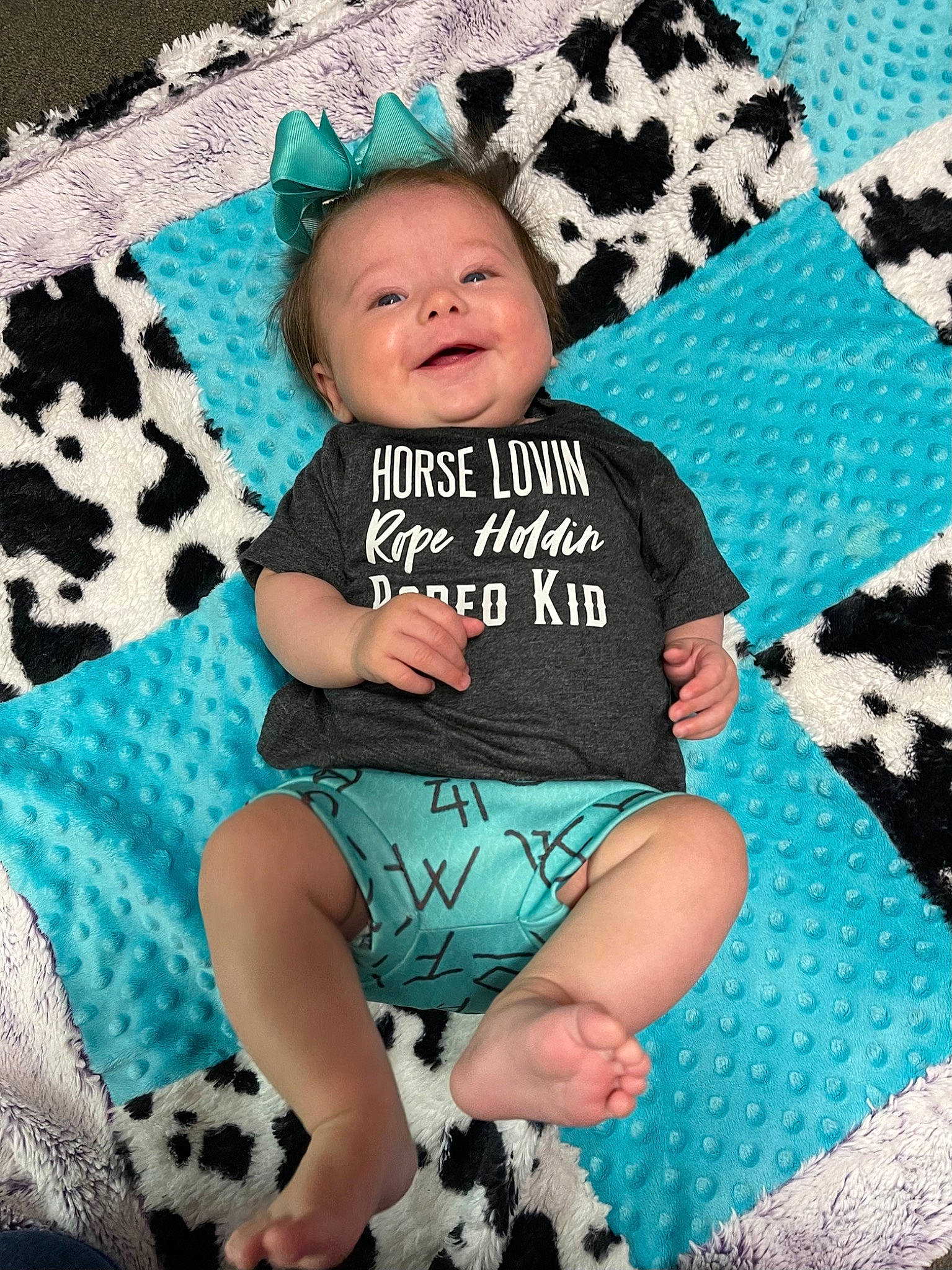 Kacee joined the competition — help win amazing prizes! aqua, azure, baby_toddler_clothing, black, blue, green, happy, head, linens, pattern, person, photograph, pink, product, purple, shorts, sleeve, smile, thigh, toddler