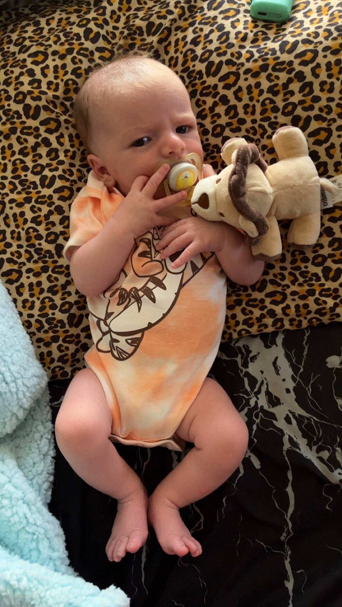 Caine is registered to the contest to win money with this photo: abdomen, baby, baby_toddler_clothing, chest, child, comfort, happy, head, human_body, knee, mammal, nail, person, skin, stomach, thigh, thumb, toddler, toy, trunk