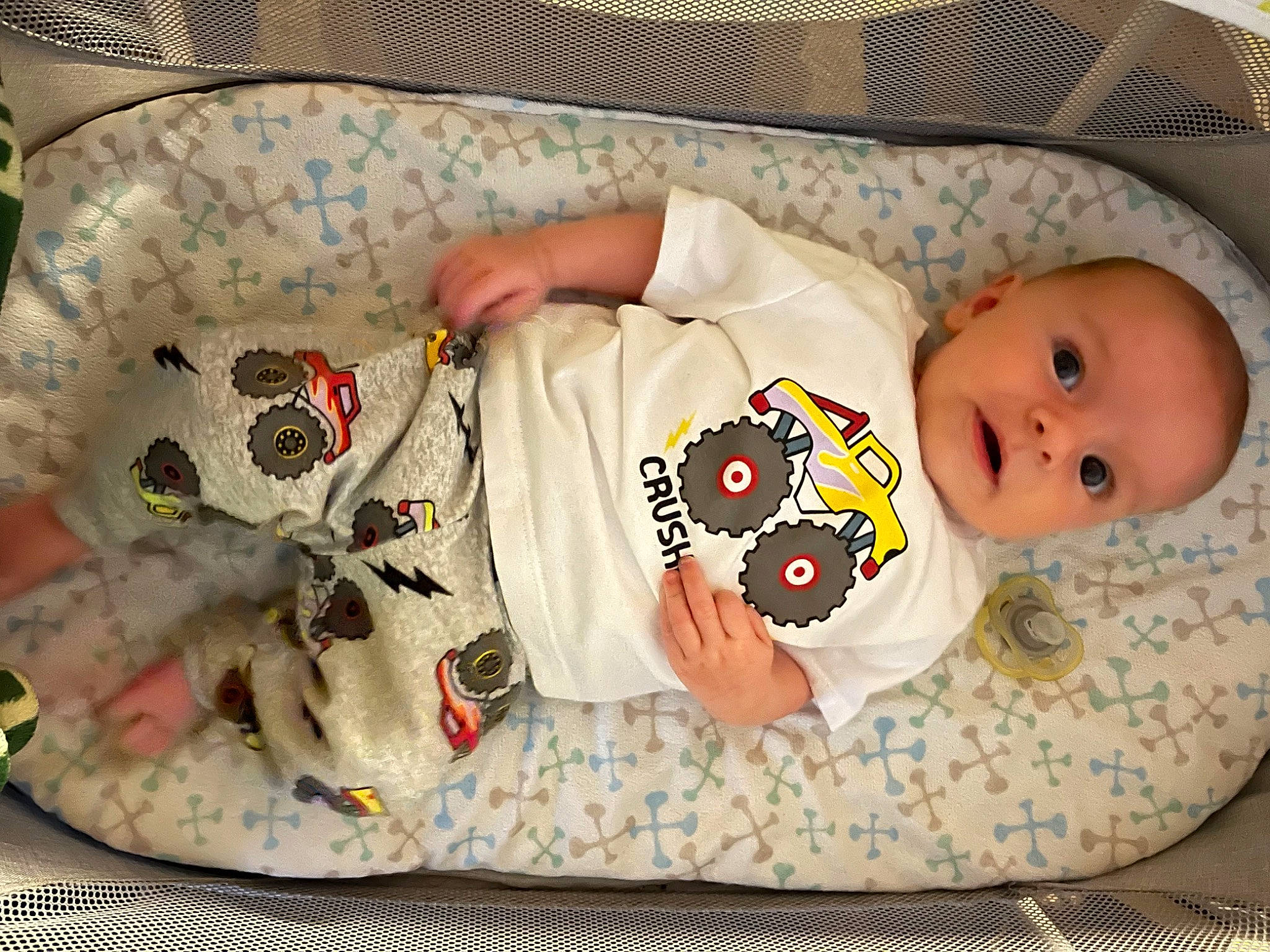 Caine is registered to the contest to win money with this photo: baby, baby_products, baby_safety, baby_sleeping, baby_toddler_clothing, child, comfort, human_body, linens, pattern, person, product, room, sleeve, textile, toddler