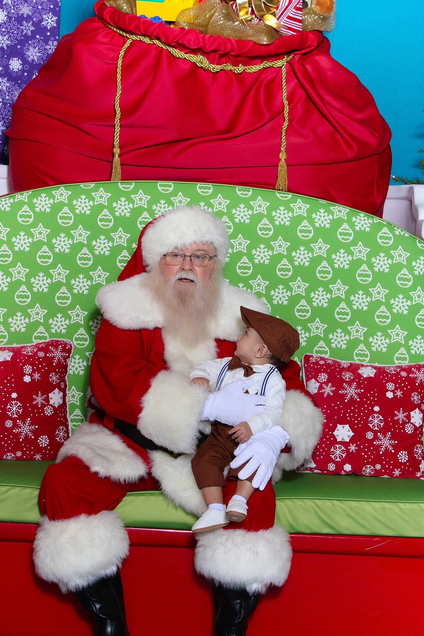 Joel joined the competition — help win amazing prizes! beard, carmine, christmas, christmas_decoration, christmas_eve, comfort, decoration, event, fictional_character, fun, green, hat, headwear, holiday, interior_design, lap, person, photograph, red, santa_claus