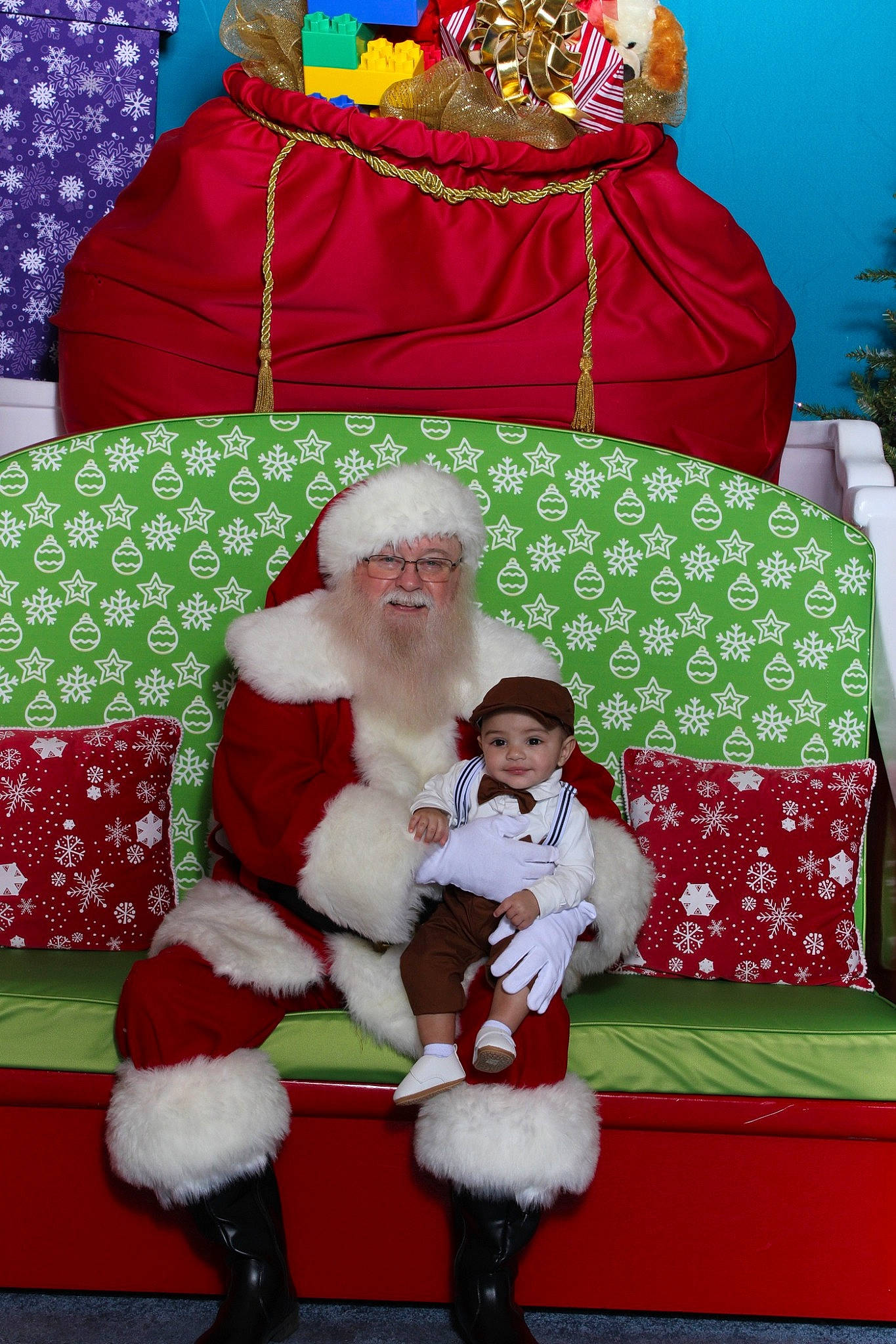 Joel joined the competition — help win amazing prizes! christmas, christmas_decoration, christmas_eve, comfort, decoration, event, fictional_character, fun, fur, green, happy, hat, headwear, holiday, joy, lap, person, red, santa_claus, smile