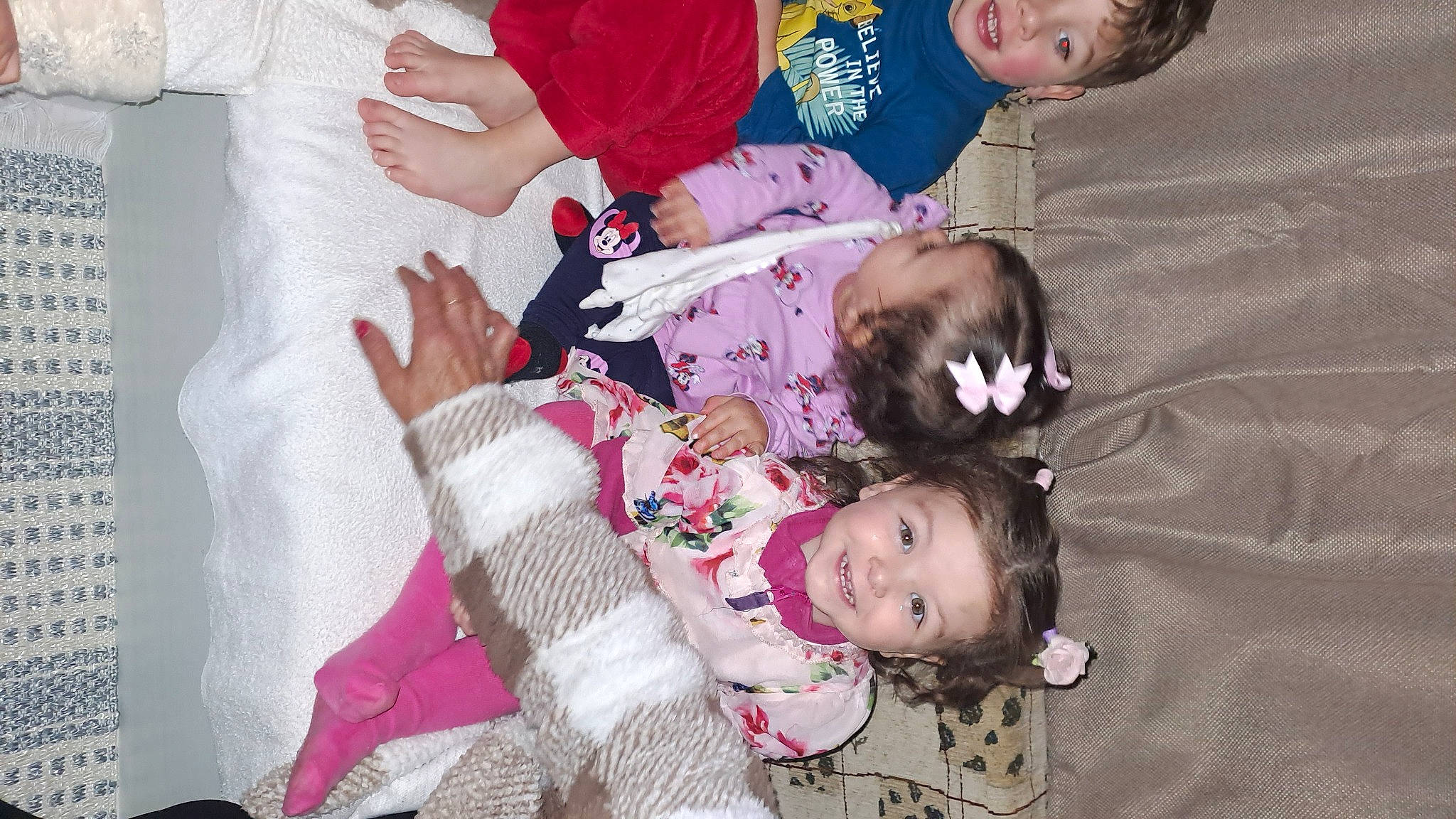 Amaya participe au concours pour gagner de l'argent avec cette photo : baby, baby_toddler_clothing, child, comfort, fun, gesture, grass, happy, interaction, joy, lap, magenta, pattern, person, photograph, pink, product, skin, sleeve, smile