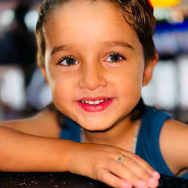 Juan Alberto is registered to the contest to win money with this photo: accessories, blackhair, blonde, bodypart, boy, child, dimples, face, finger, hair, hand, happy, head, jewelry, male, person, photography, portrait, ring, smile
