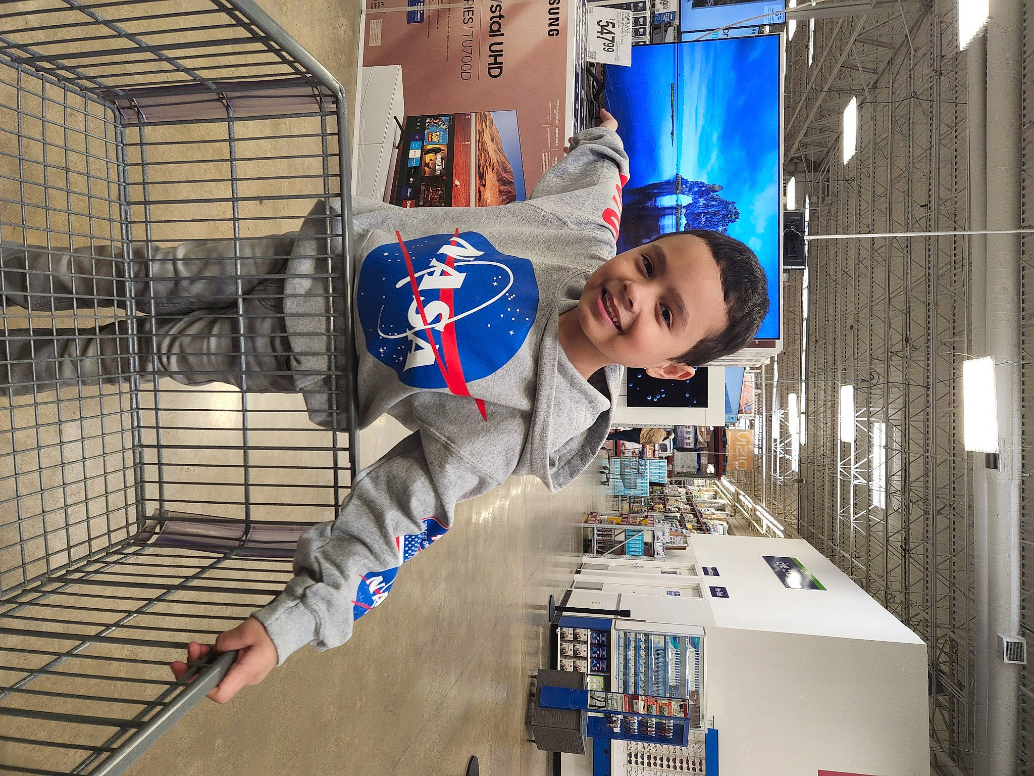 David is registered to the contest to win money with this photo: advertising, aerospace_engineering, automotive_design, electric_blue, engineering, eyewear, factory, gas, job, joy, logo, machine, metal, person, retail, sleeve, smile, sports_uniform, sportswear, t_shirt