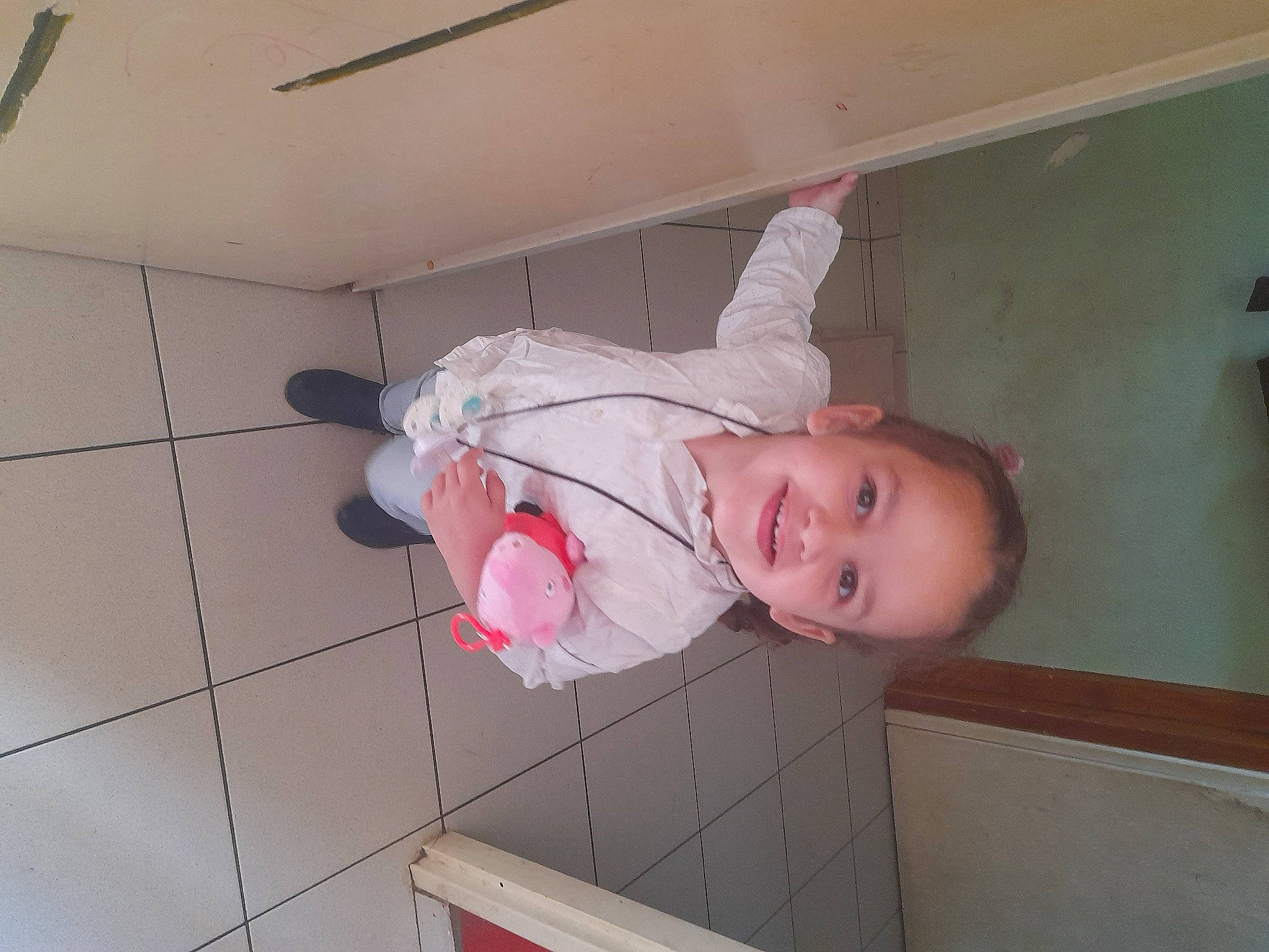 Mandy participe au concours pour gagner de l'argent avec cette photo : baby, baby_products, baby_toddler_clothing, ceiling, child, floor, flooring, foot, fun, hardwood, house, joy, person, plaster, room, smile, tile, toddler, wood