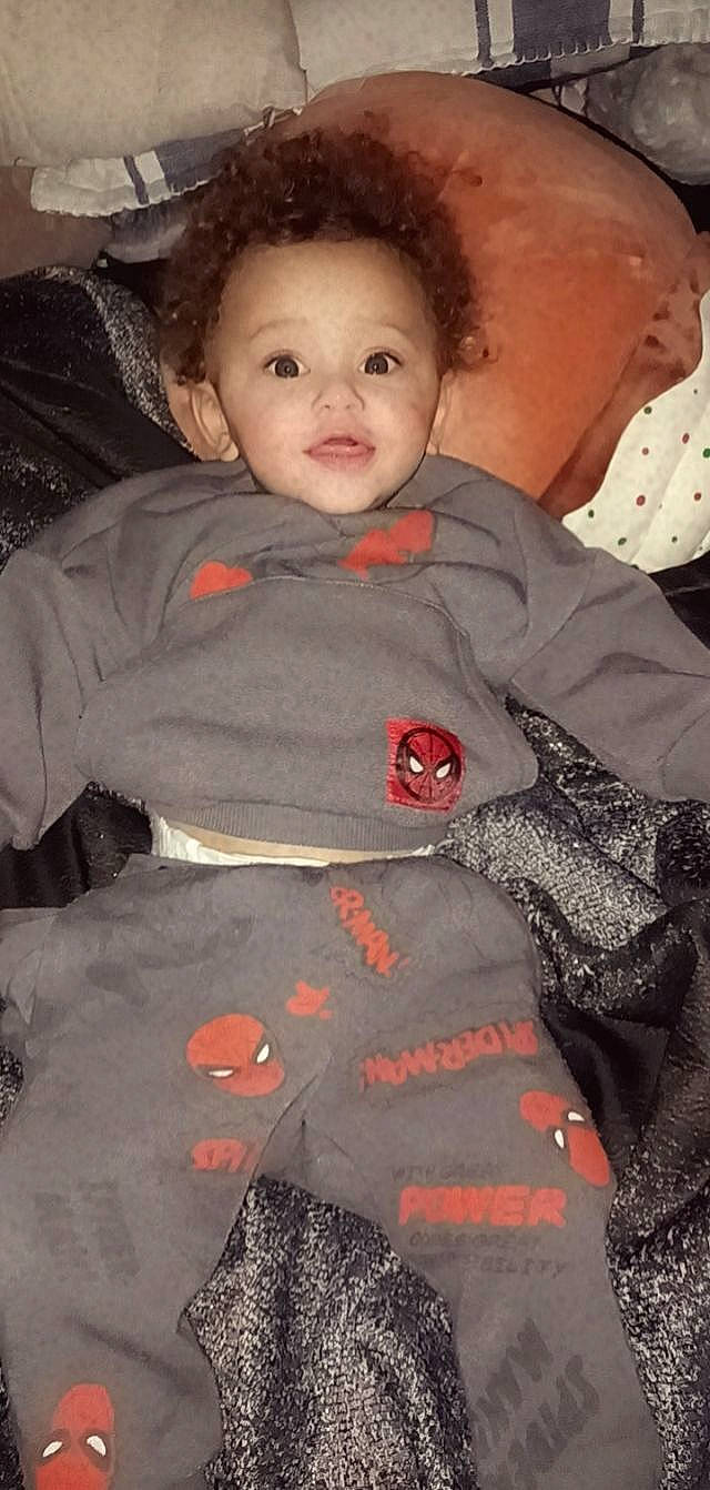 Nehemiah joined the competition — help win amazing prizes! baby, baby_toddler_clothing, beauty, cheek, child, comfort, eye, face, fur, head, iris, linens, lip, nose, pattern, person, sitting, skin, sleeve, t_shirt