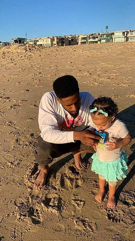 Serenity joined the competition — help win amazing prizes! adaptation, beach, ecoregion, fun, geology, glasses, grass, happy, hat, landscape, leisure, natural_environment, people_in_nature, person, sitting, sky, soil, sunglasses, t_shirt, toddler