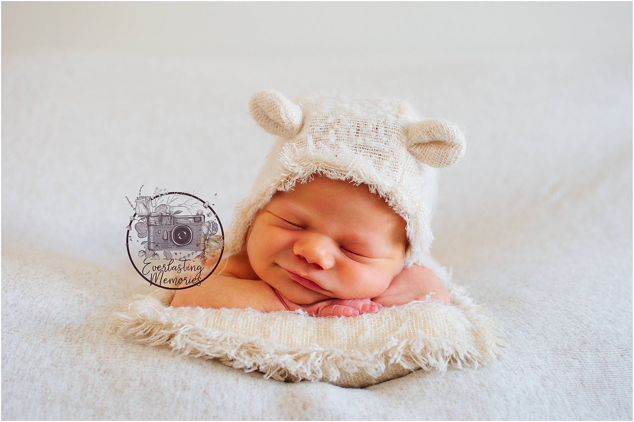 Billie is registered to the contest to win money with this photo: art, baby, baby_toddler_clothing, beige, cap, costume_hat, creative_arts, embellishment, fashion_accessory, fur, hair_accessory, headband, headgear, headpiece, headwear, jewellery, linens, person, picture_frame, product