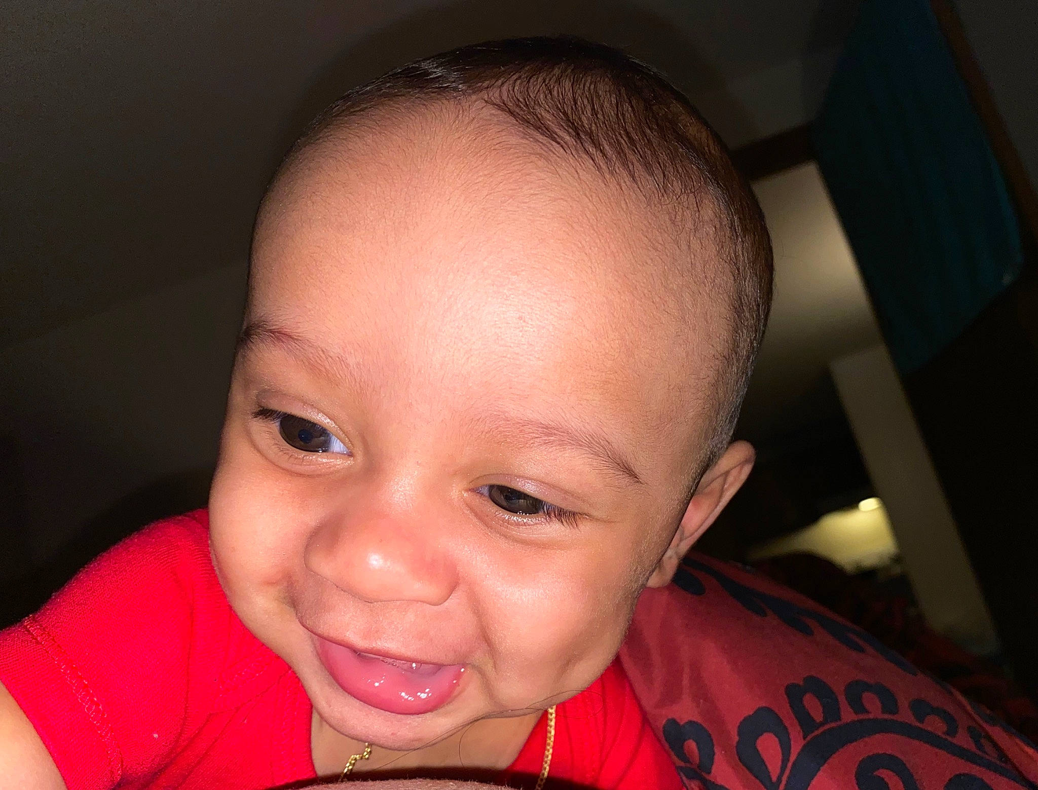 Kartier is registered to the contest to win money with this photo: baby, cheek, child, chin, close_up, ear, eye, eyebrow, face, facial_expression, forehead, hair, hairstyle, head, lip, mouth, nose, person, skin, smile