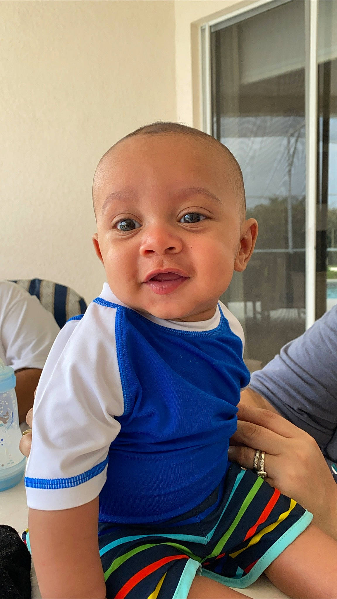 Kartier joined the competition — help win amazing prizes! arm, baby, blue, cheek, child, chin, eye, face, hand, head, nose, people, person, sitting, skin, smile, t_shirt, toddler, vacation, yellow