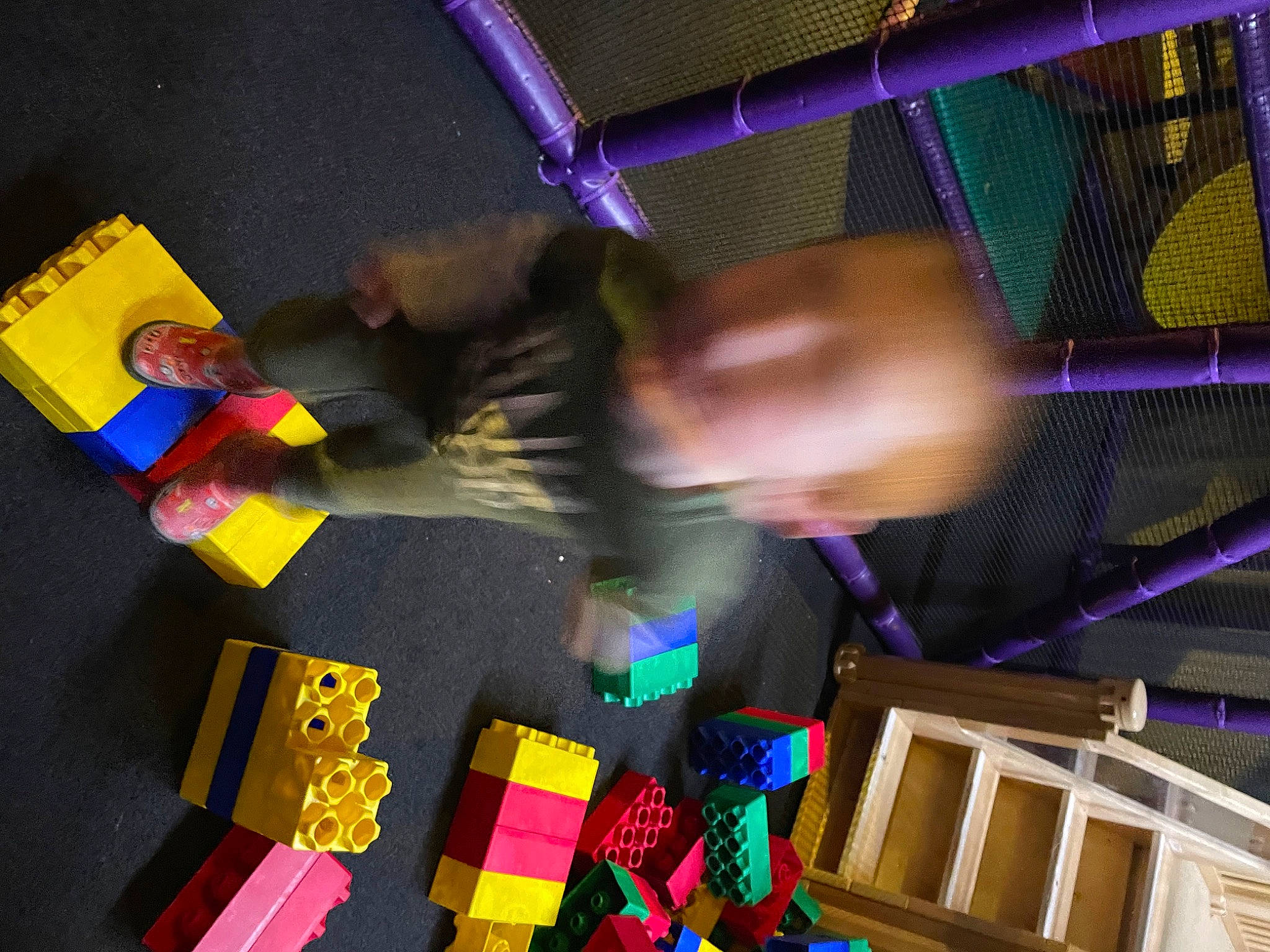 Hunter is registered to the contest to win money with this photo: ceiling, entertainment, event, fun, games, graphic_design, leisure, light, lighting, magenta, mesh, night, person, play, purple, recreation, room, space, toy_block, visual_arts