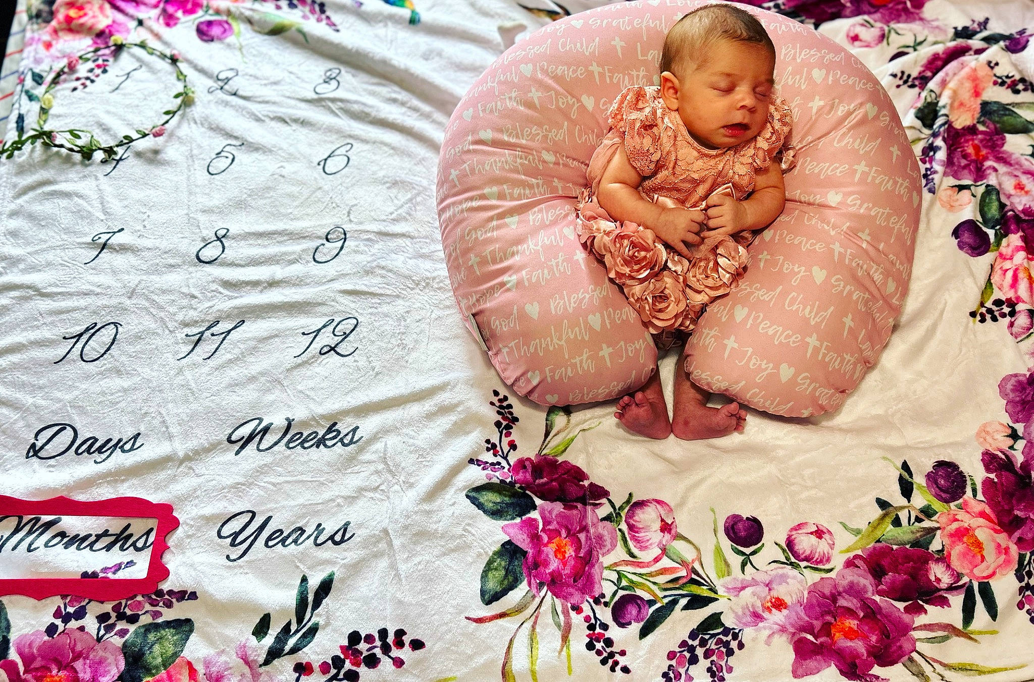 Adalia is registered to the contest to win money with this photo: baby, child, event, floral_design, flower, font, happy, illustration, jewellery, linens, love, magenta, pattern, people_in_nature, person, petal, photo_caption, pink, plant, textile