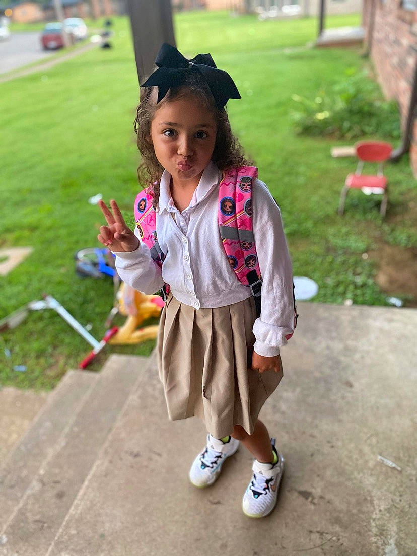 Bry'Leigh is registered to the contest to win money with this photo: child, costume, event, fashion_accessory, fun, grass, happy, hat, leisure, magenta, person, plant, play, recreation, sandal, shoe, sitting, sneakers, toddler, vacation