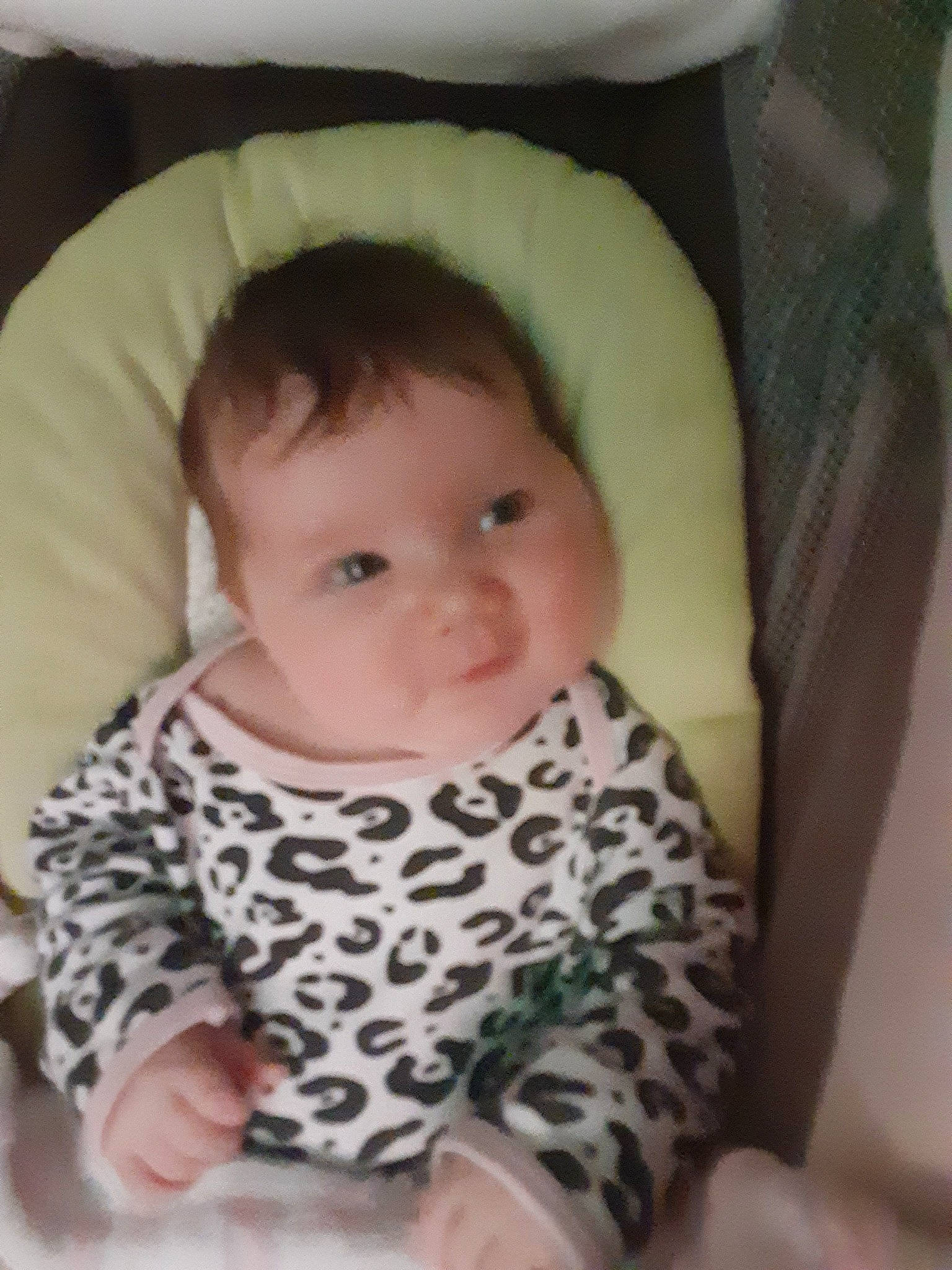 Lillian is registered to the contest to win money with this photo: baby, baby_products, baby_toddler_clothing, cheek, child, chin, comfort, eye, eyebrow, face, finger, iris, linens, lip, nose, pattern, person, sitting, skin, sleeve