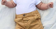 Enzo joined the competition — help win amazing prizes! adorable, baby, baby_face, blanket, casual, child, clothing, cute, happy, infant, infant_fashion, lying_down, newborn, portrait, shoes, small_hands, smiling, soft_texture, tan_pants, white_onesie