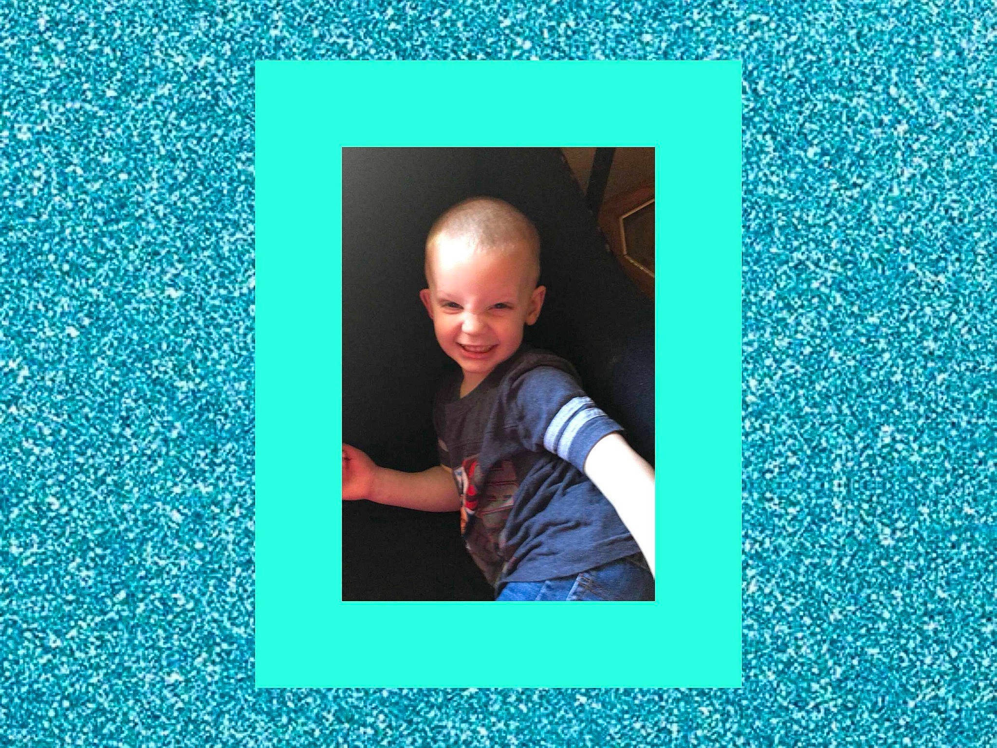 Earl is registered to the contest to win money with this photo: aqua, art, azure, blue, circle, denim, electric_blue, flash_photography, font, joy, magenta, pattern, person, product, rectangle, room, shirt, sleeve, smile, symmetry