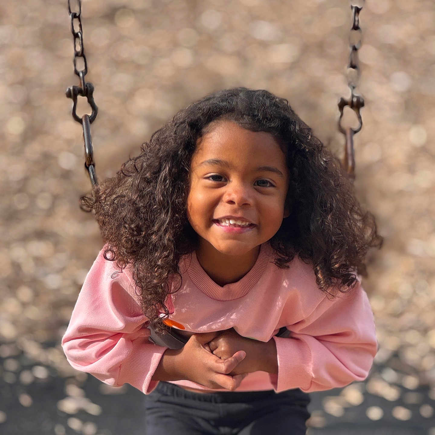 Alexandria is registered to the contest to win money with this photo: bodypart, child, clothing, face, female, footwear, girl, hair, happy, head, outdoorplayarea, outdoors, pants, person, photography, playarea, portrait, shoe, smile, toy