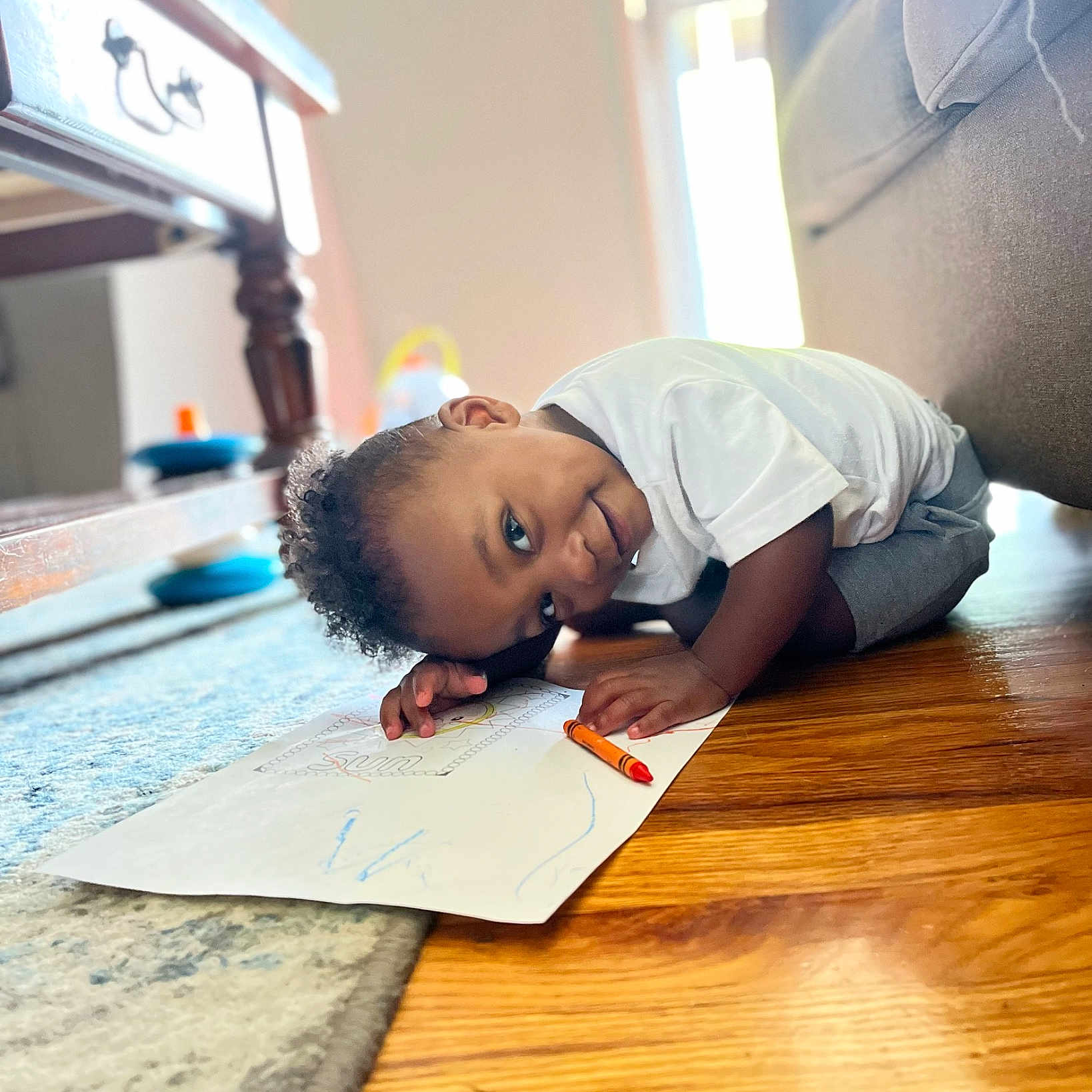 Ahmani joined the competition — help win amazing prizes! baby, child, comfort, floor, flooring, fun, happy, hardwood, knee, laminate_flooring, leisure, room, sitting, t_shirt, toddler, varnish, wood, wood_flooring, wood_stain, writing