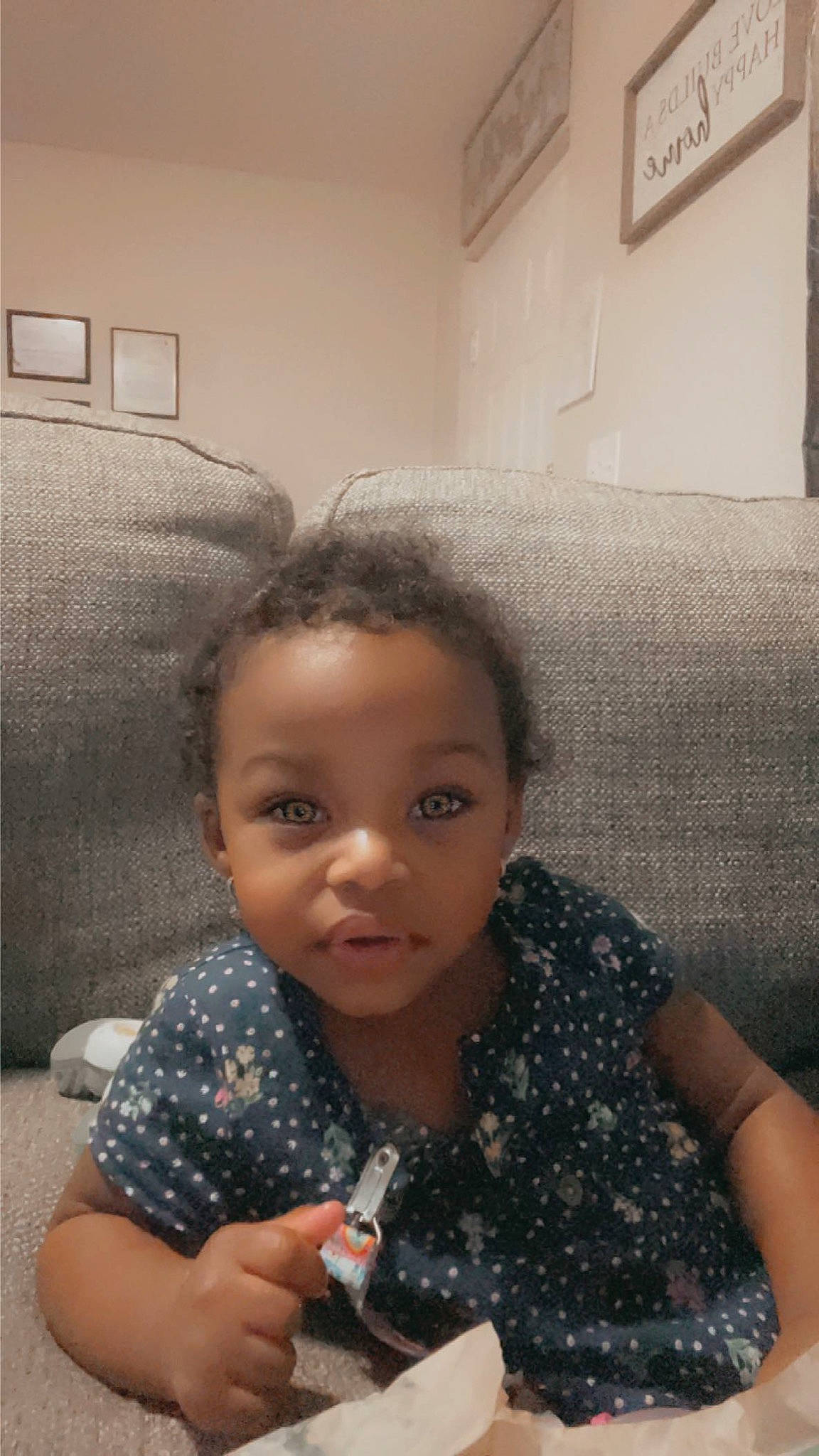 Jayleen is registered to the contest to win money with this photo: baby_toddler_clothing, cheek, child, chin, comfort, eyebrow, eyelash, face, forehead, fun, happy, iris, lip, mouth, nose, person, picture_frame, room, sitting, skin
