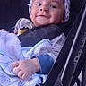 Jasper joined the competition — help win amazing prizes! baby, blanket, stroller, child, smiling, hat, clothing, infant, face, person, bundle, comfort, seatbelt, cute, young, portrait, indoors, soft, warm, happy