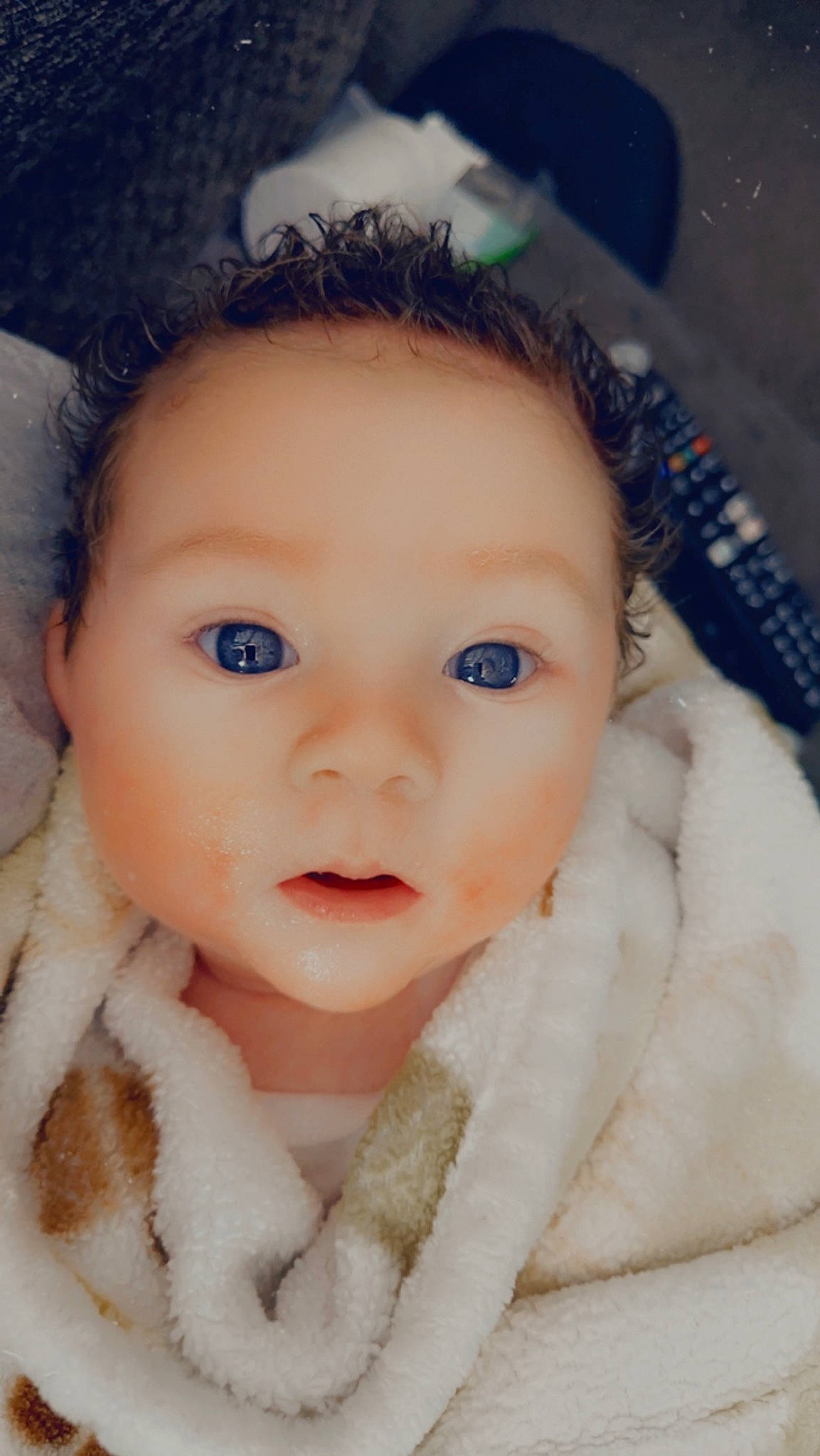Reed is registered to the contest to win money with this photo: azure, baby, baby_toddler_clothing, cheek, child, chin, close_up, electric_blue, eyebrow, eyelash, flash_photography, fun, fur, happy, iris, lip, nose, person, skin, textile