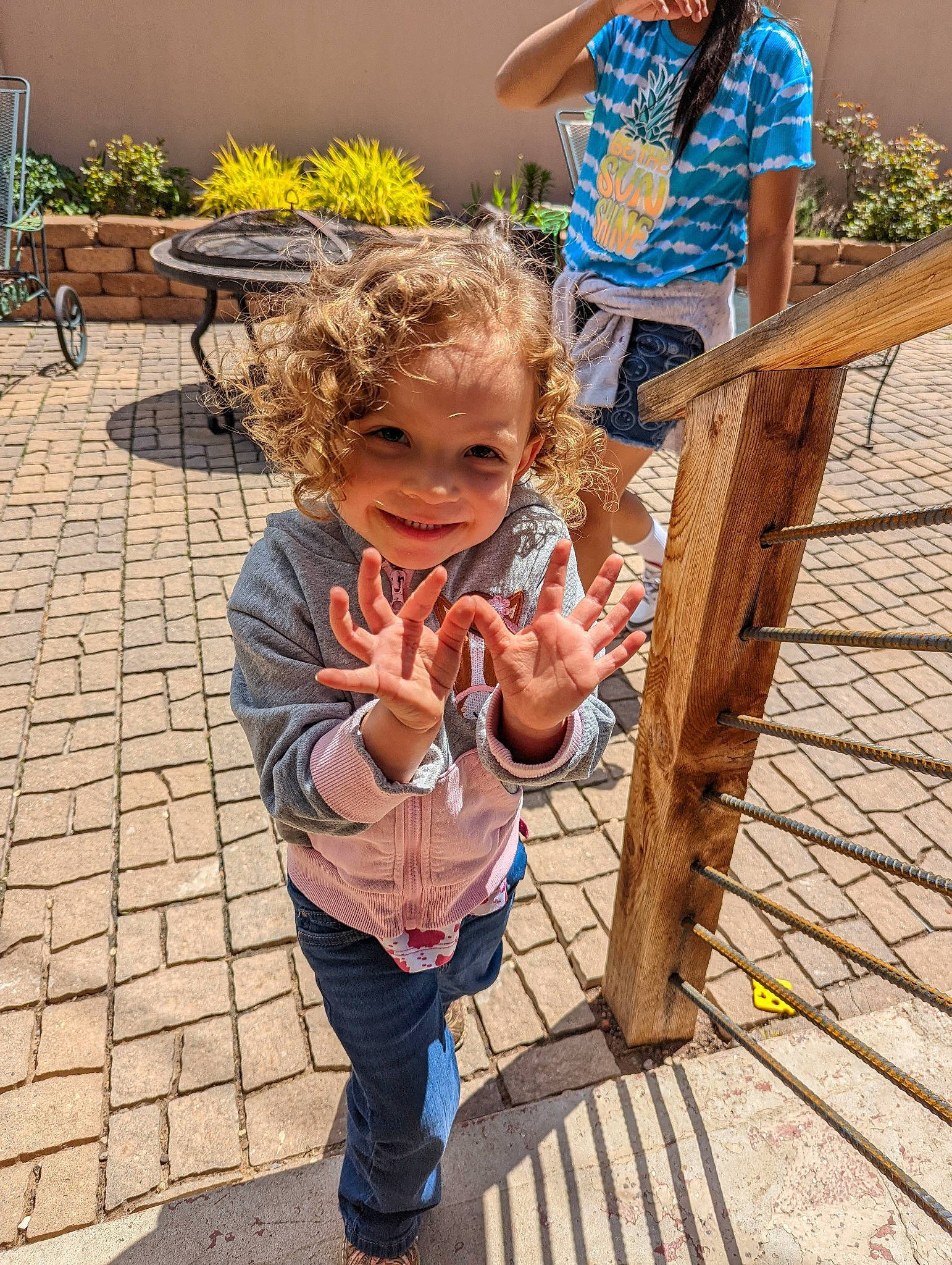 Addilynn is registered to the contest to win money with this photo: child, flower, fun, grass, happy, joy, leisure, people_in_nature, person, plant, recreation, shoe, shorts, smile, sneakers, soil, standing, tire, toddler, wheel