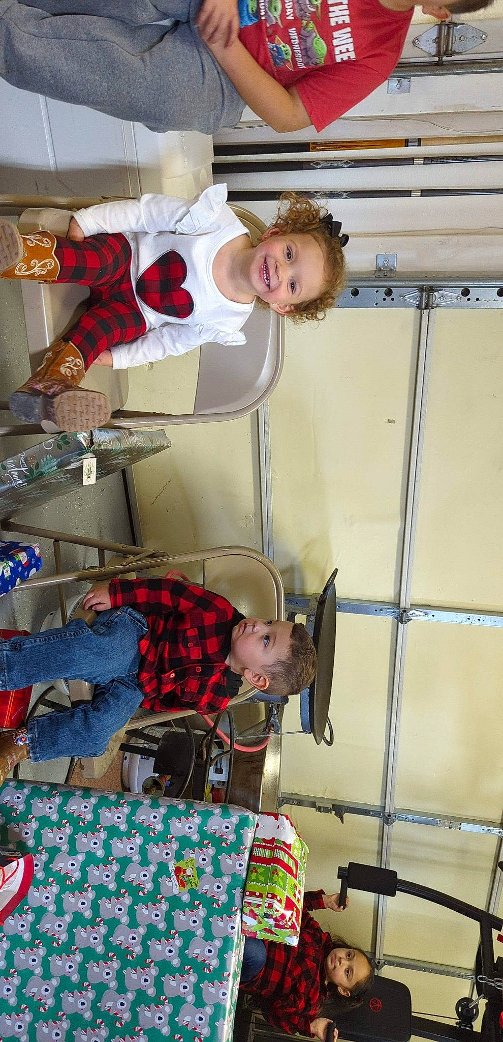 Addilynn is registered to the contest to win money with this photo: ceiling, child, comfort, event, fun, happy, joy, leisure, pattern, person, plaid, room, sitting, smile, t_shirt, tartan, toddler