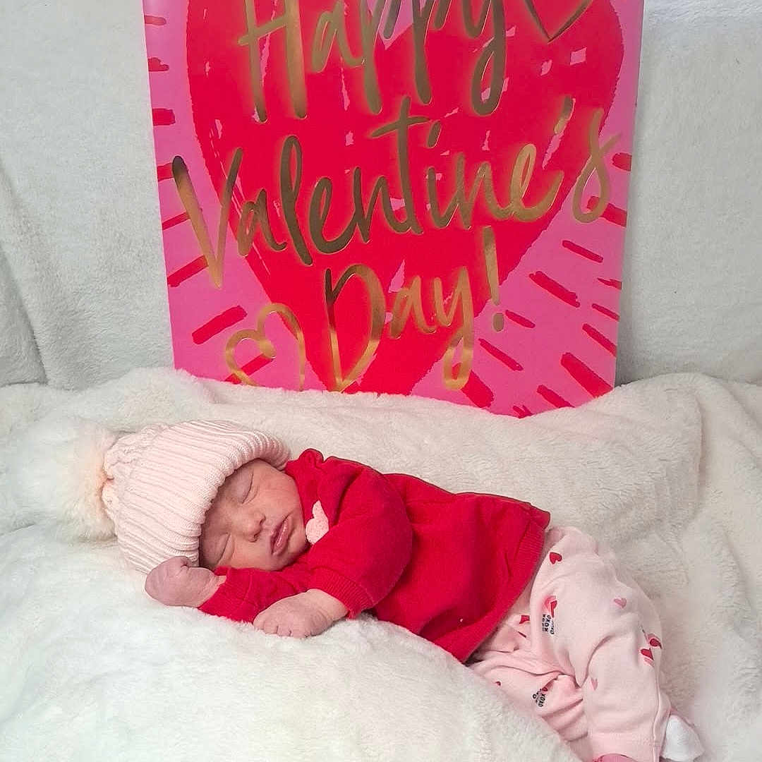 Bayli-Ann joined the competition — help win amazing prizes! baby, bed, bedroom, blanket, businesscard, clothing, cushion, face, furniture, hat, head, homedecor, newborn, paper, person, photography, portrait, quilt, sleeping, text